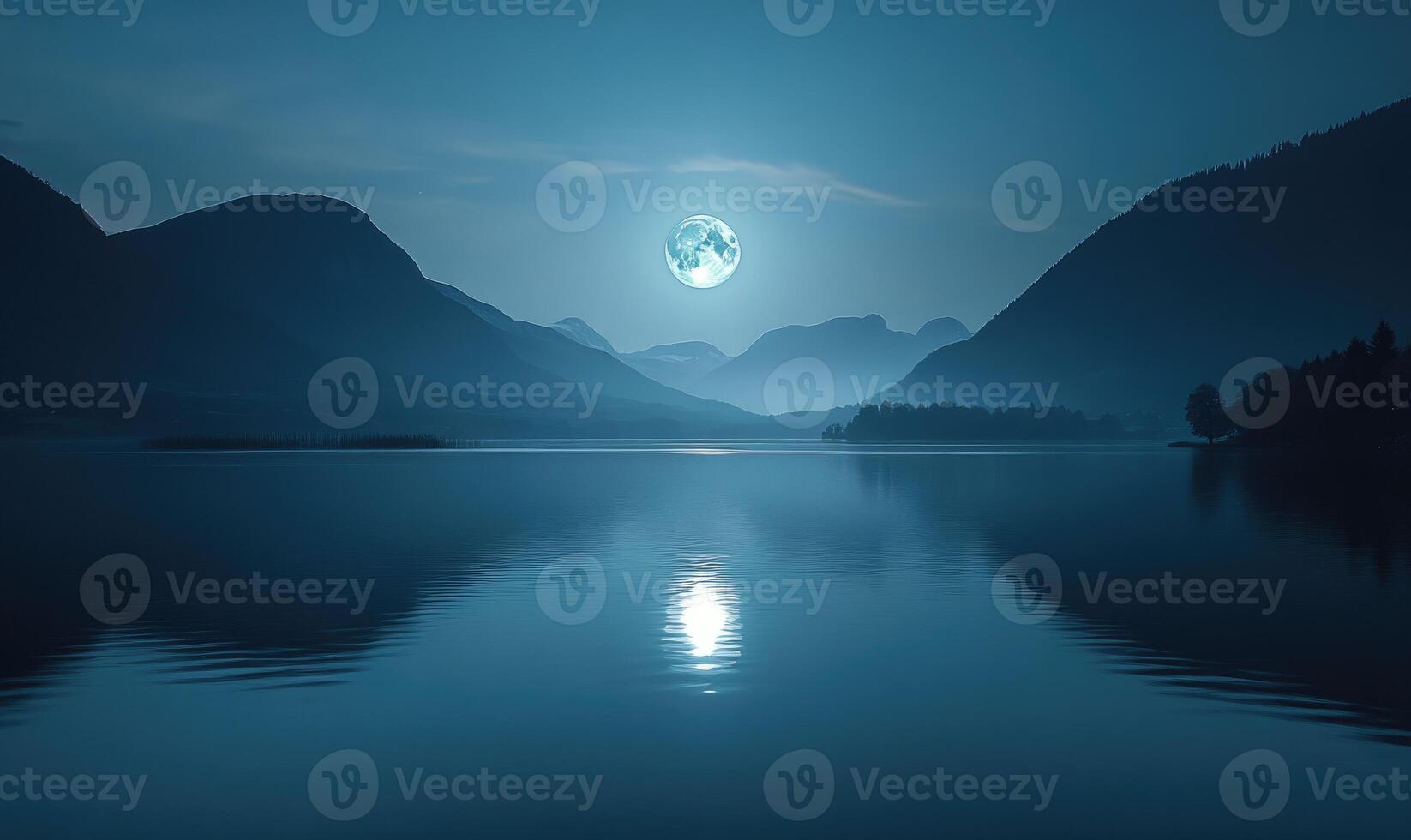 Bright full moon reflected in a still lake, distant hills barely visible in the darkness photo