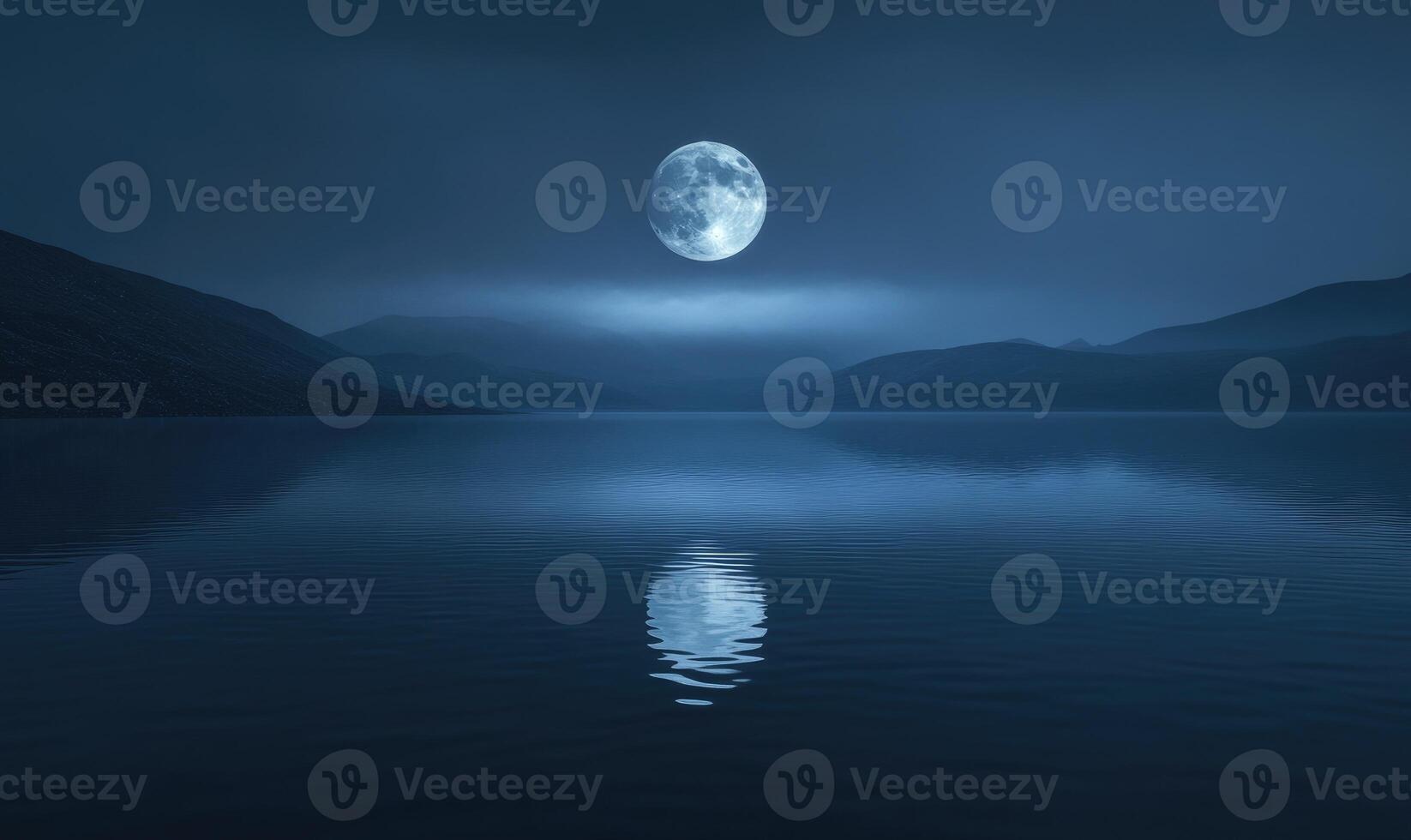 Bright full moon reflected in a still lake, distant hills barely visible in the darkness photo