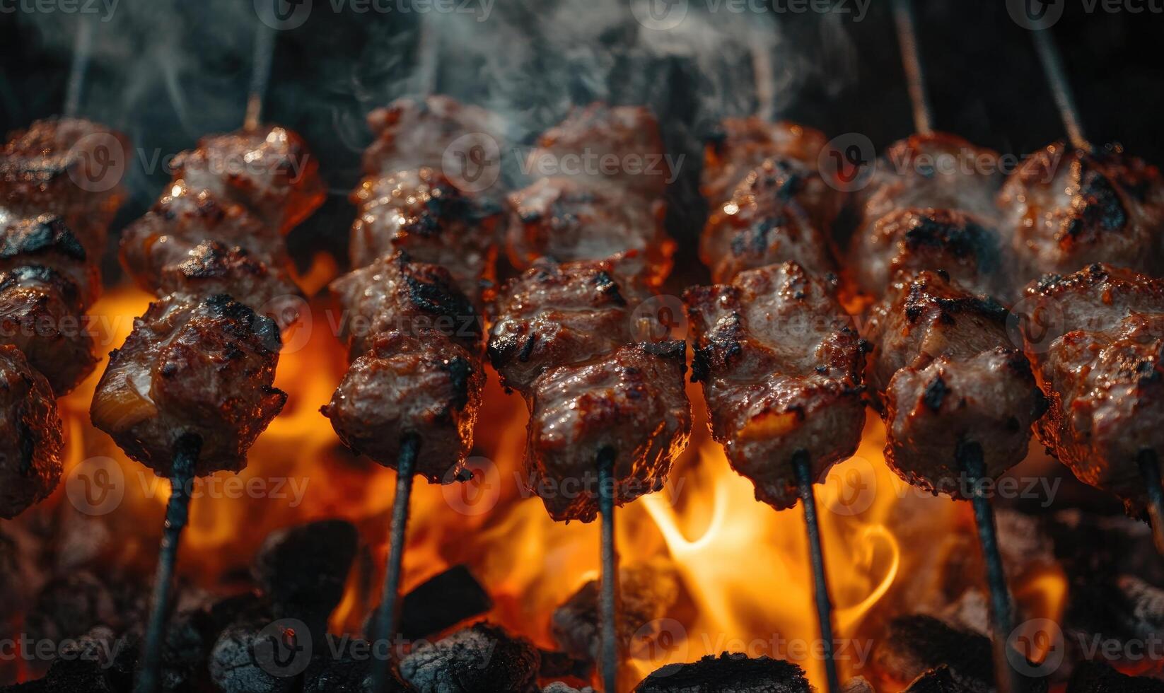 Close-up of grilled shashlik skewers, golden-brown and juicy meat sizzling over hot coals photo