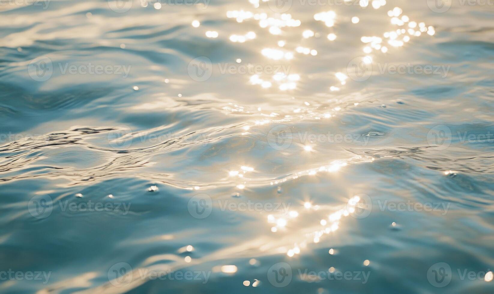 Close-up of small waves in a lake, sunlight sparkling on the water photo
