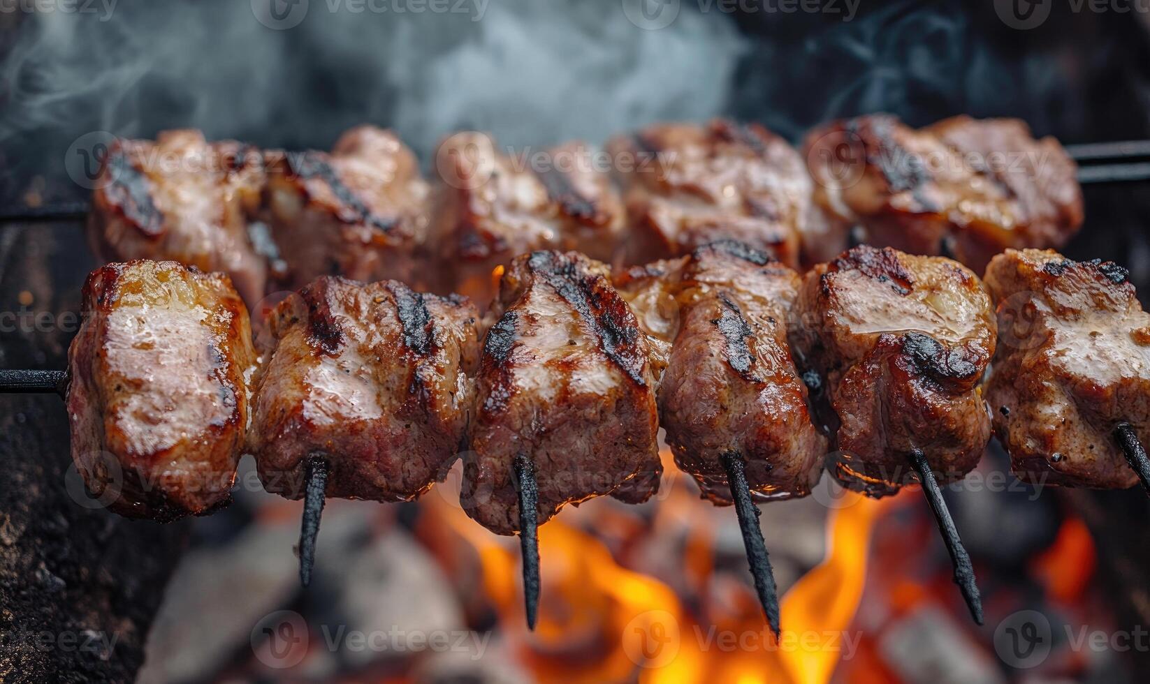 Close-up of perfectly grilled meat, caramelized edges and crispy fat glistening photo