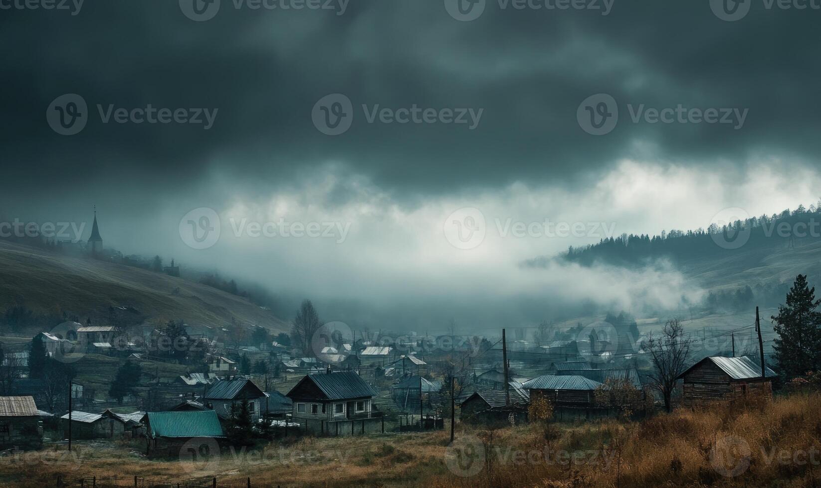 Dark clouds gathering over a quiet village, the air thick with moisture photo