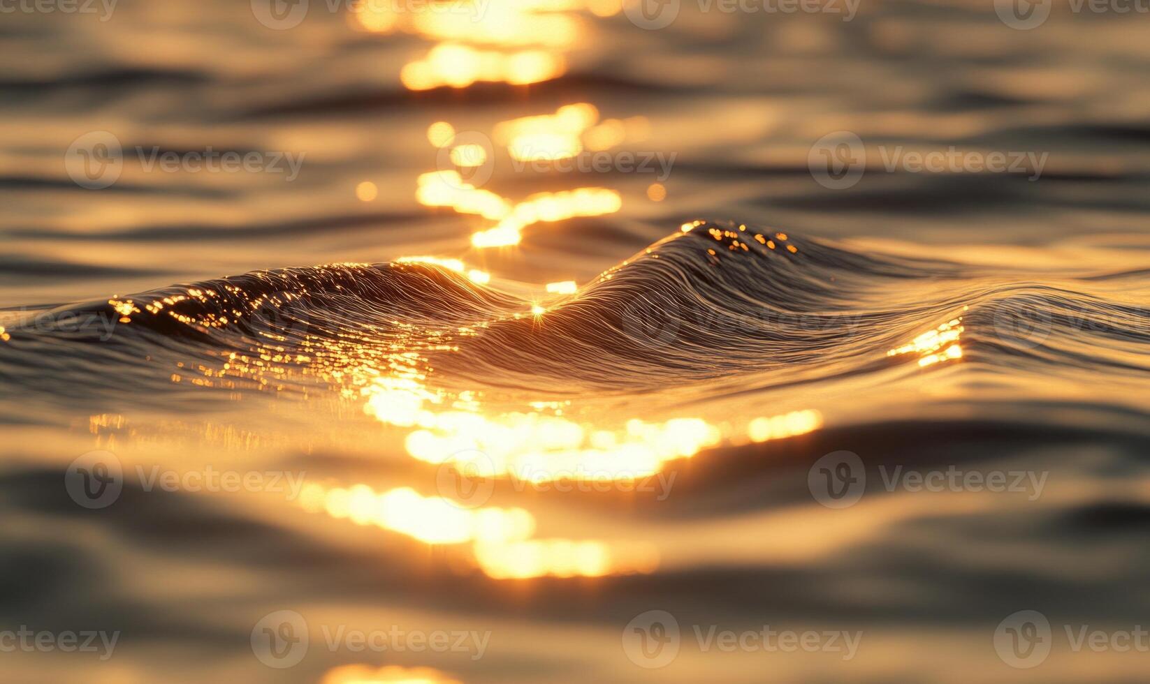 Close-up of small waves in a lake, sunlight sparkling on the water photo