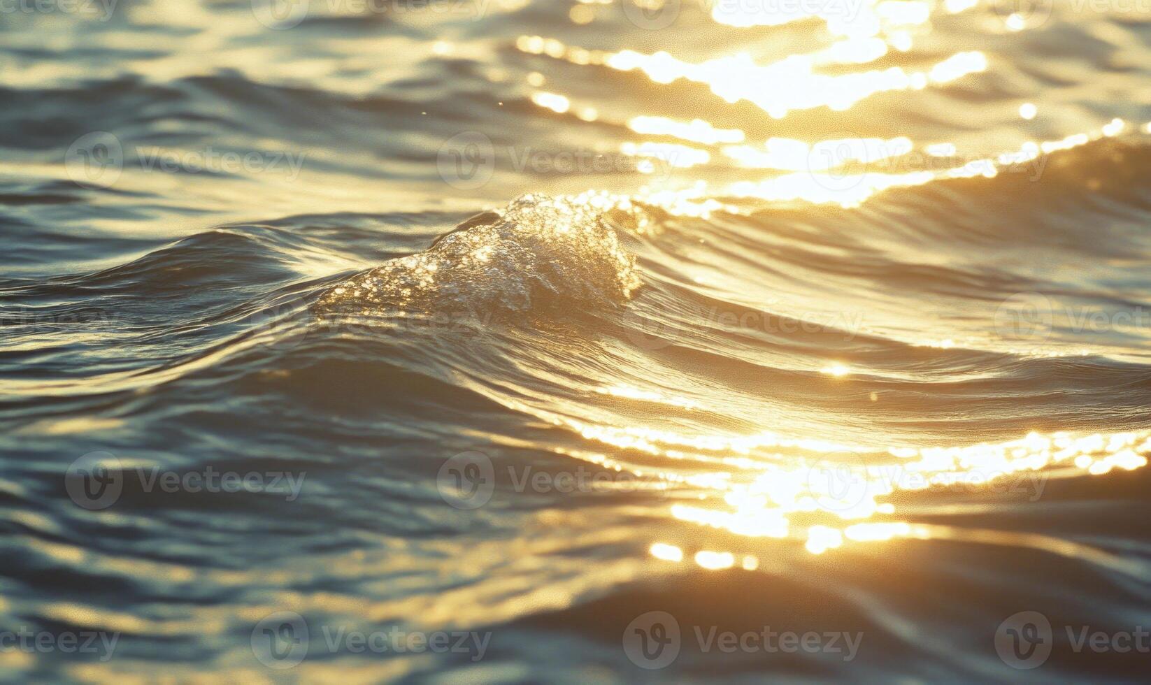 Close-up of small waves in a lake, sunlight sparkling on the water photo