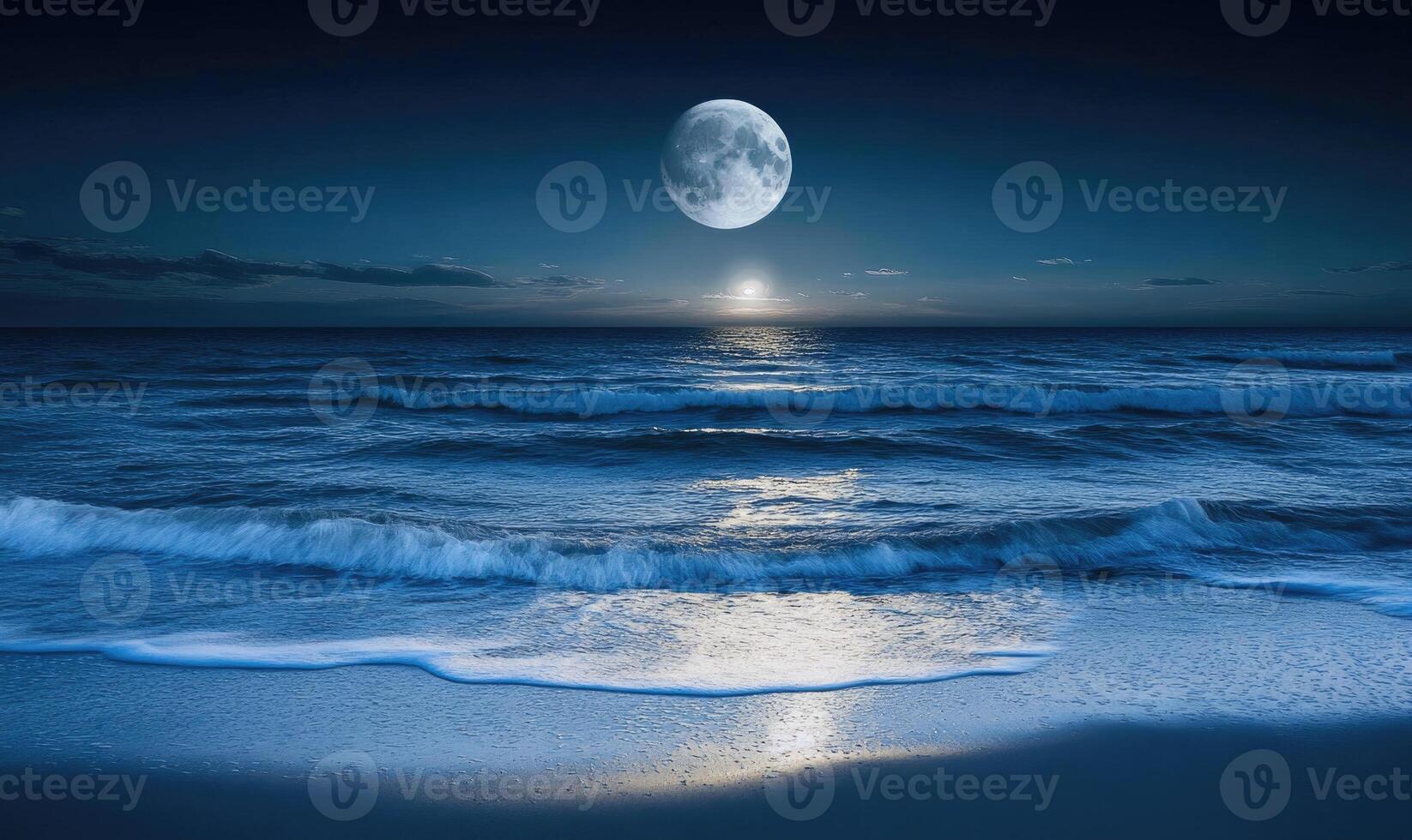 Bright moon casting a long reflection on the ocean photo