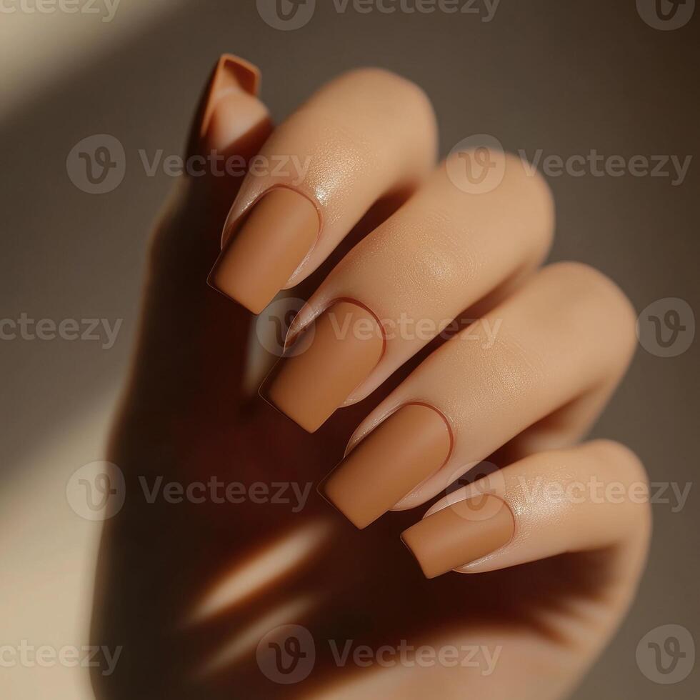 Soft warm caramel nails with a matte finish photo