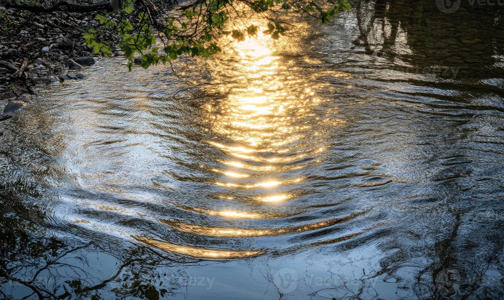 A body of water with a reflection of the sky and trees photo