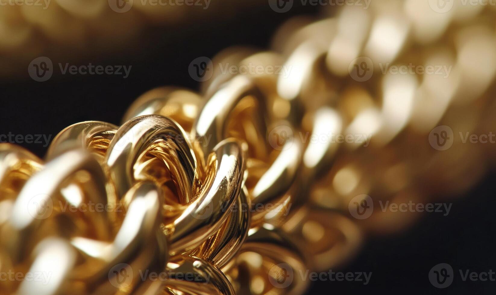 A gold chain with a gold clasp photo
