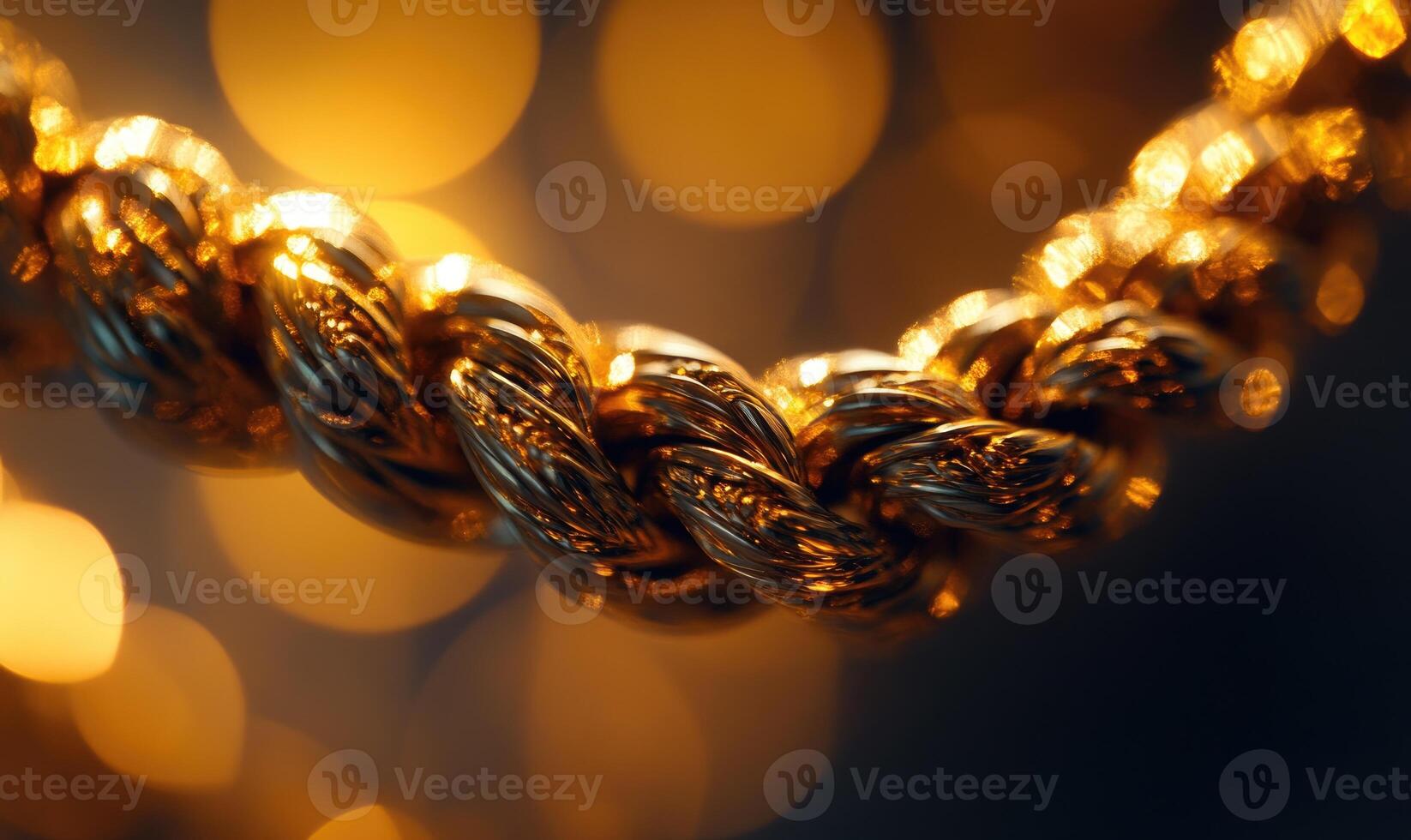 A gold chain with a knot in the middle photo