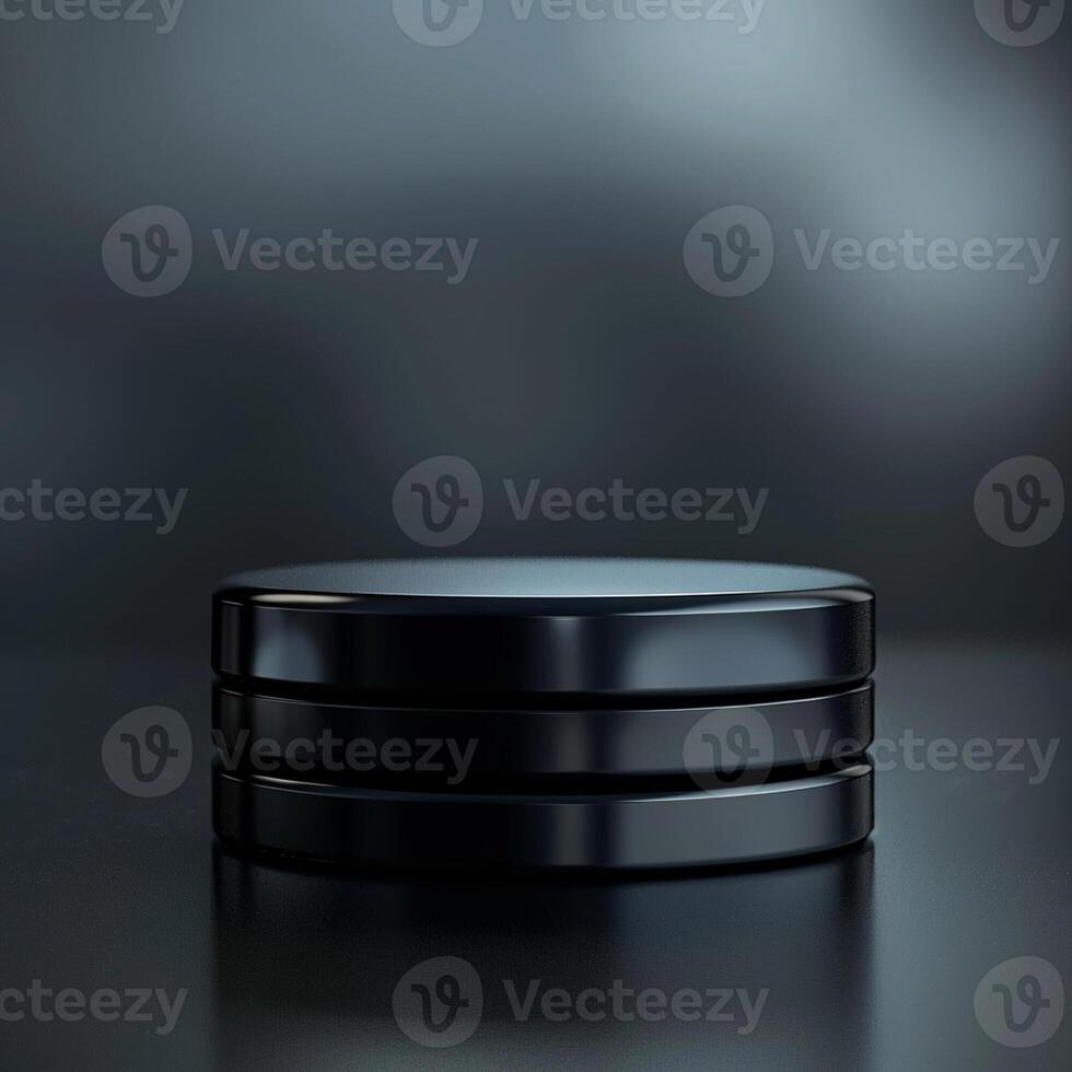 Black metal disk on a dark background photo