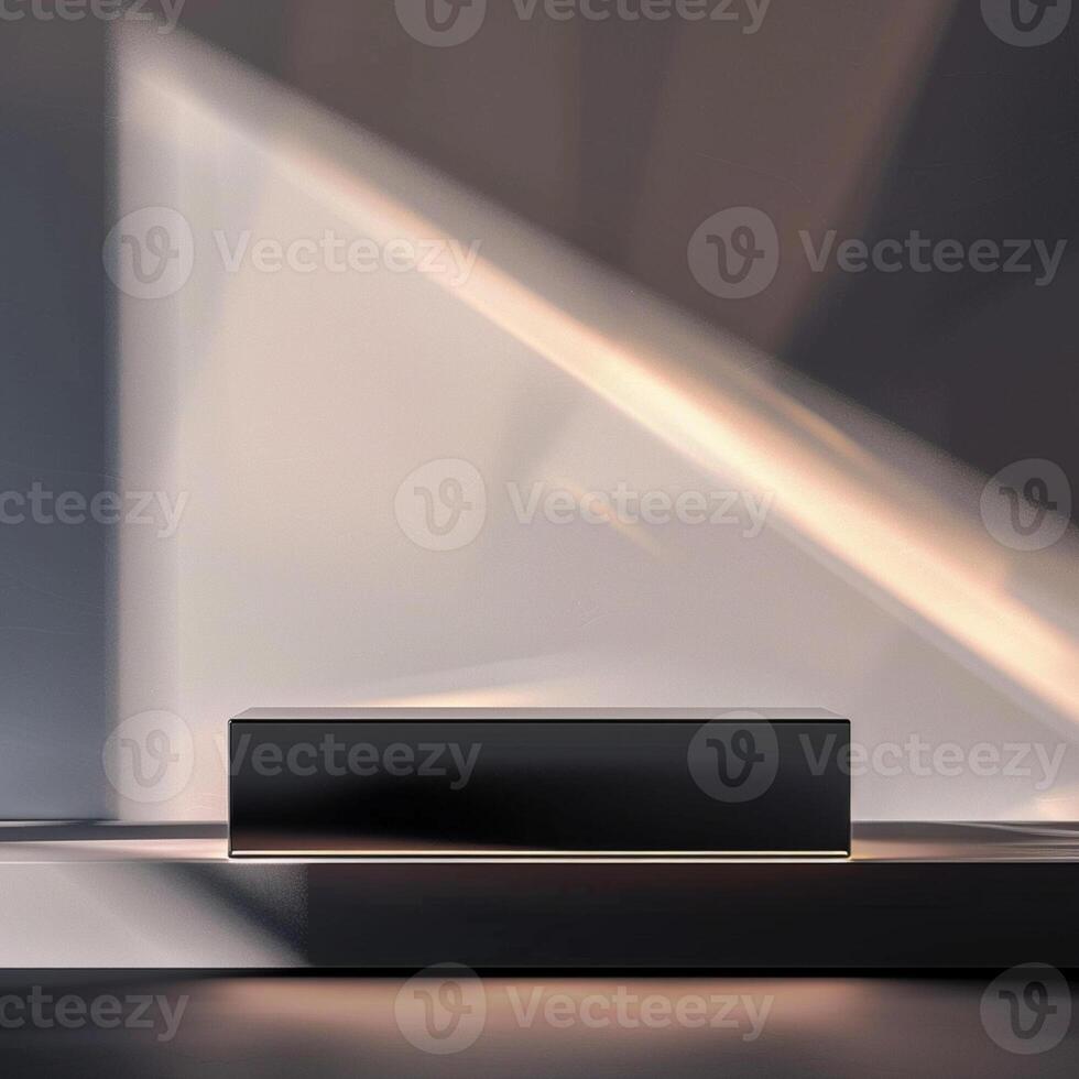 A black box sitting on a table in front of a wall photo
