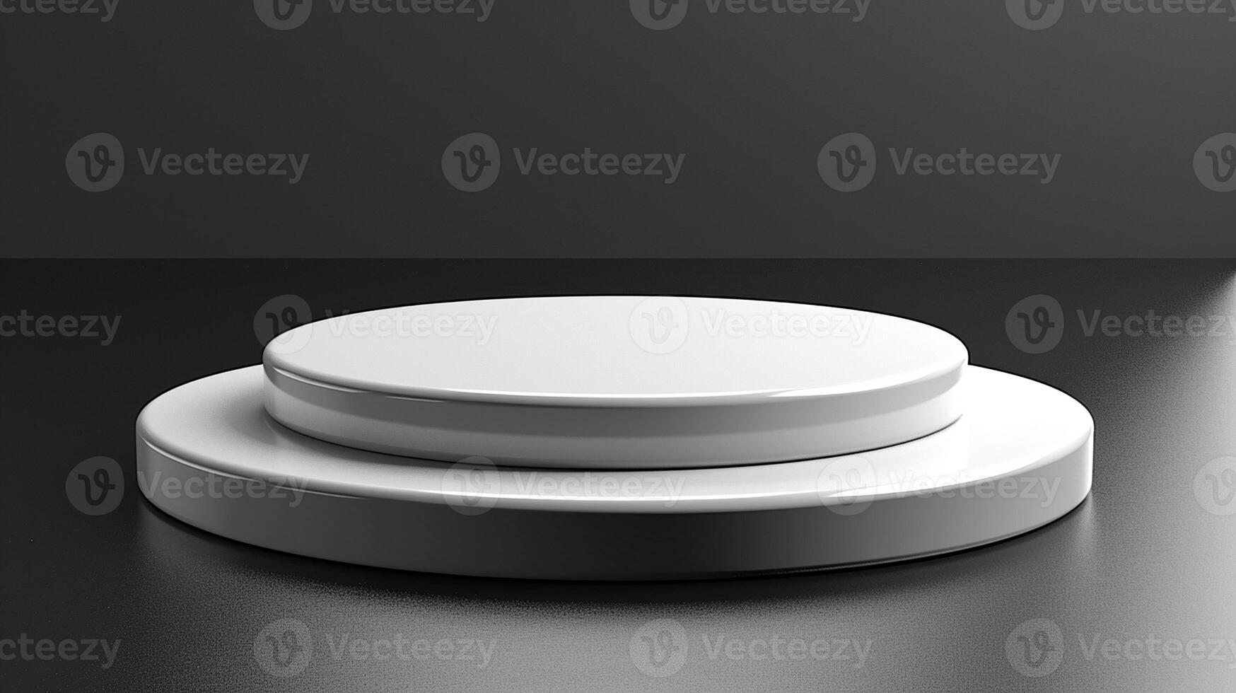 A white round button on a black surface photo