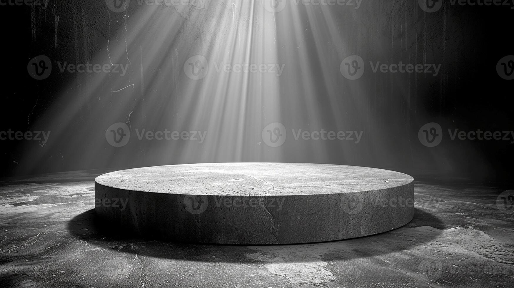 A black and white photo of a round table in the middle of a room