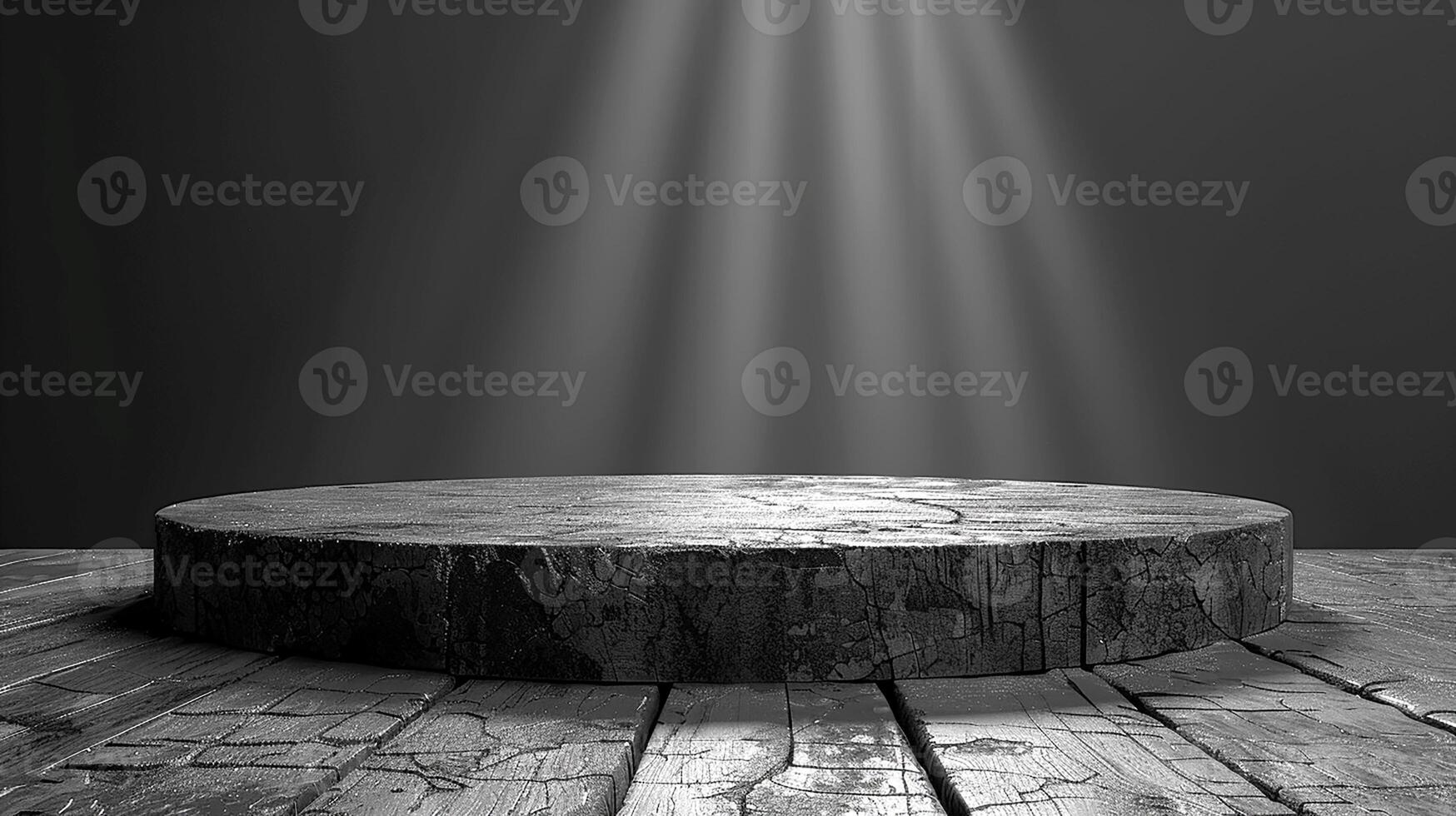 Black and white photo of a wooden table with light shining from above