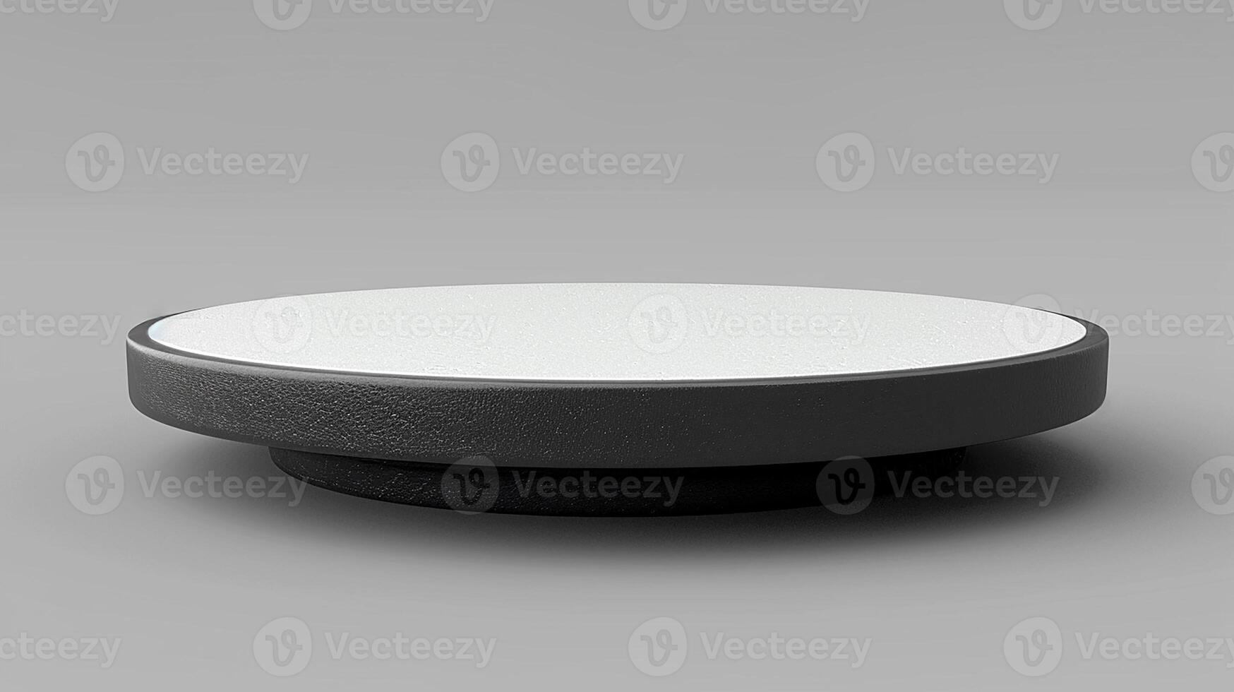 A black and white round table with a white top photo