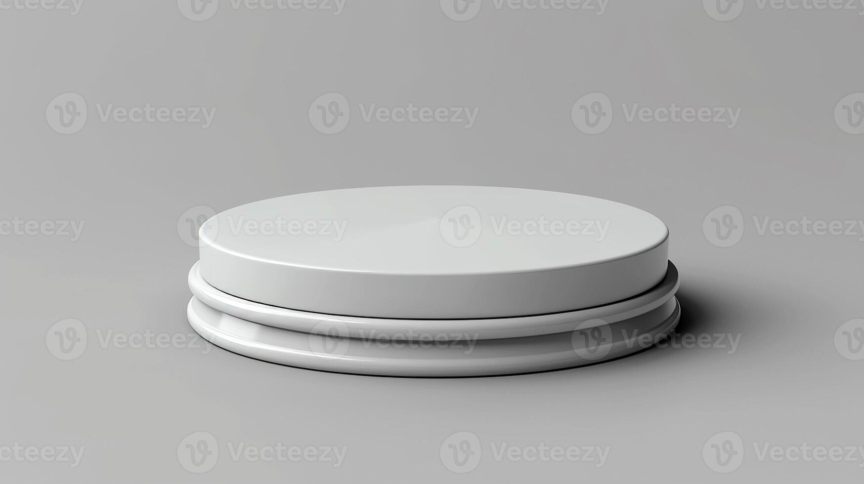 A white round object on a gray surface photo