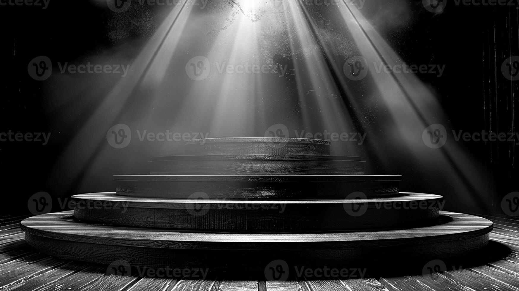 Black and white photo of a stage with a spotlight