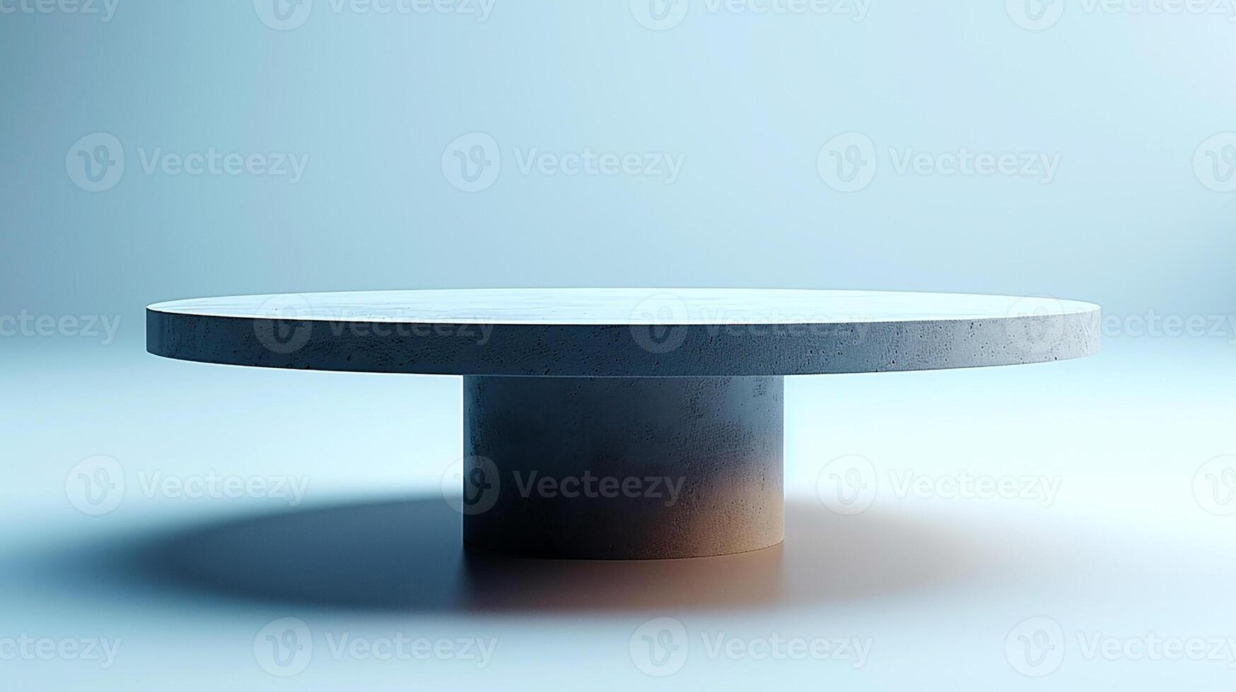 A round table with a circular base on a white surface photo