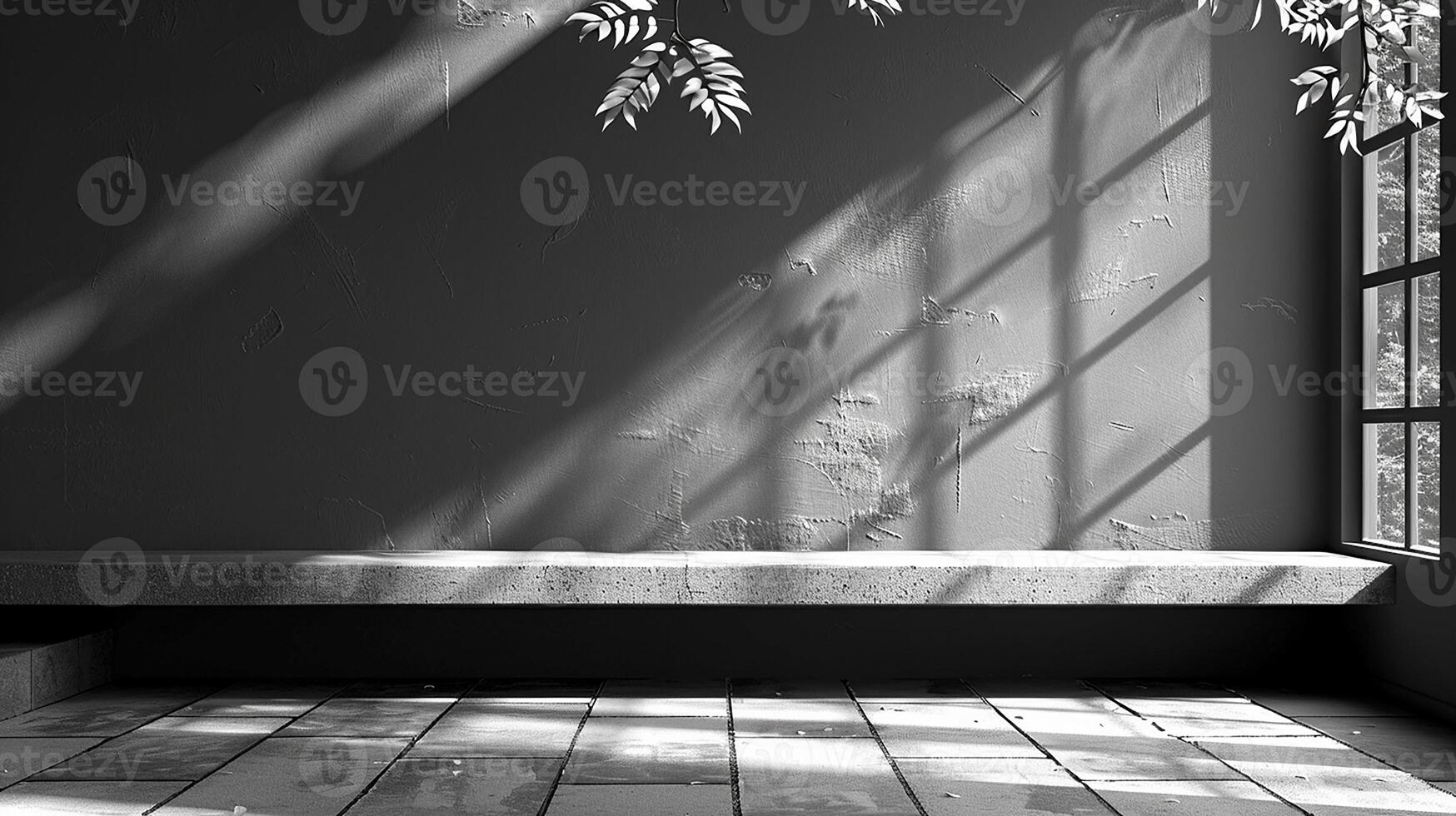 A black and white photo of a window with a tree in the corner