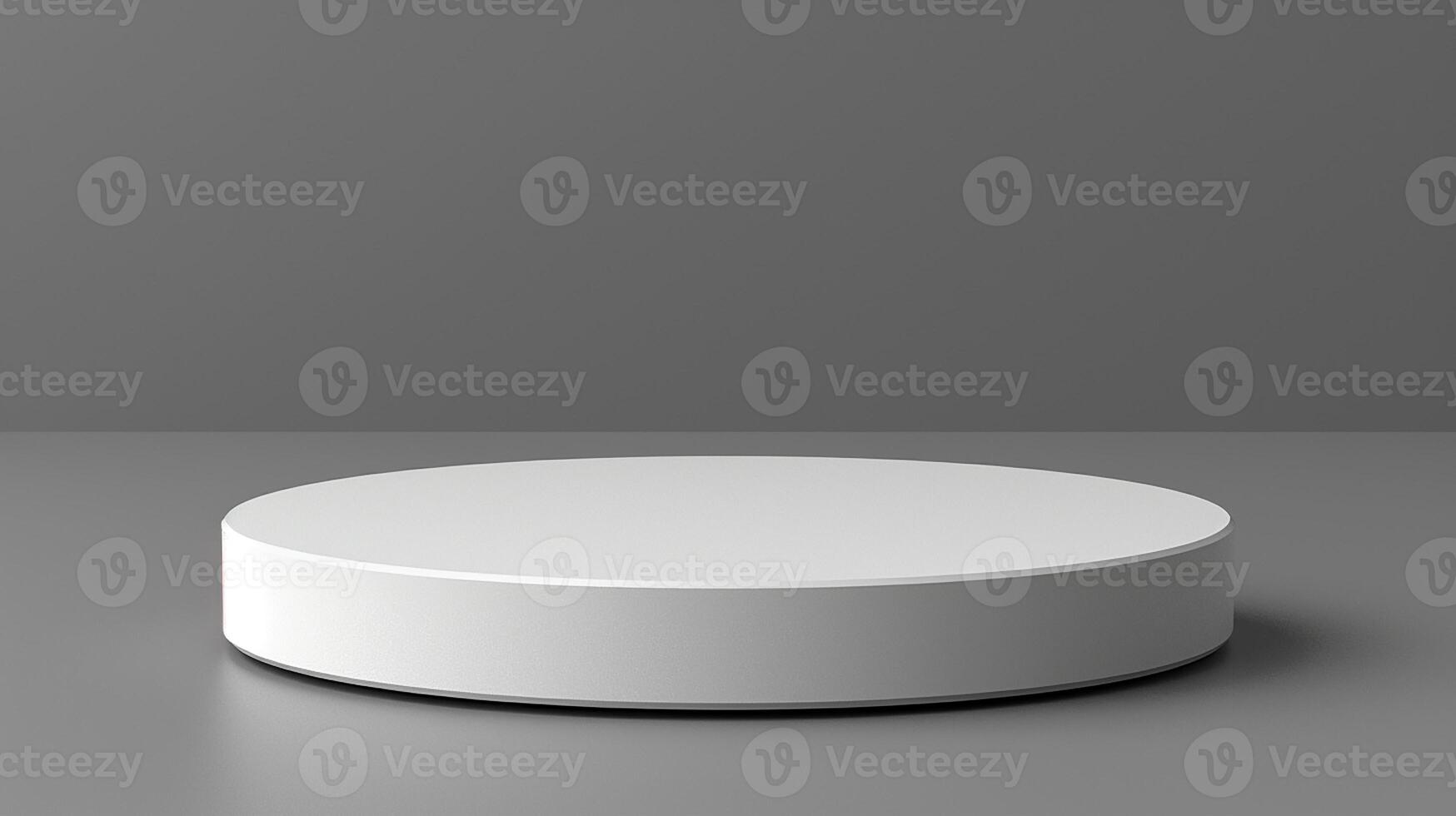 A white round table with a gray background photo