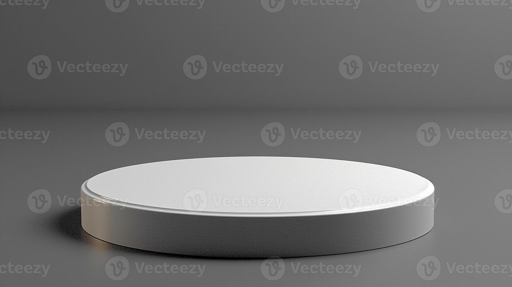 A white round object on a gray surface photo