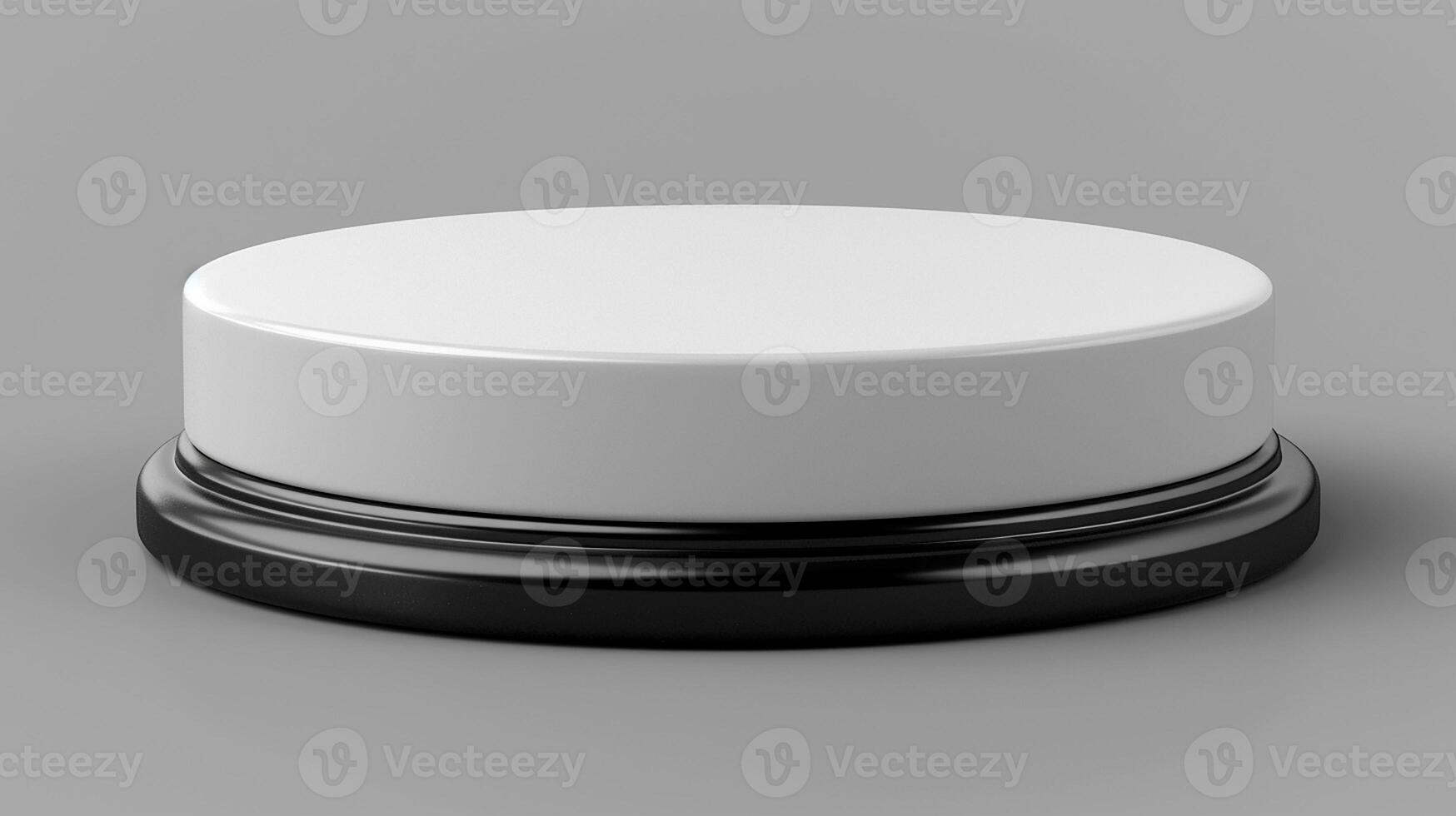 White button with black base on gray background photo