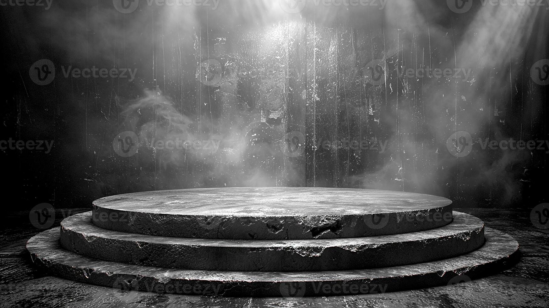 Black and white photo of a stage with a spotlight