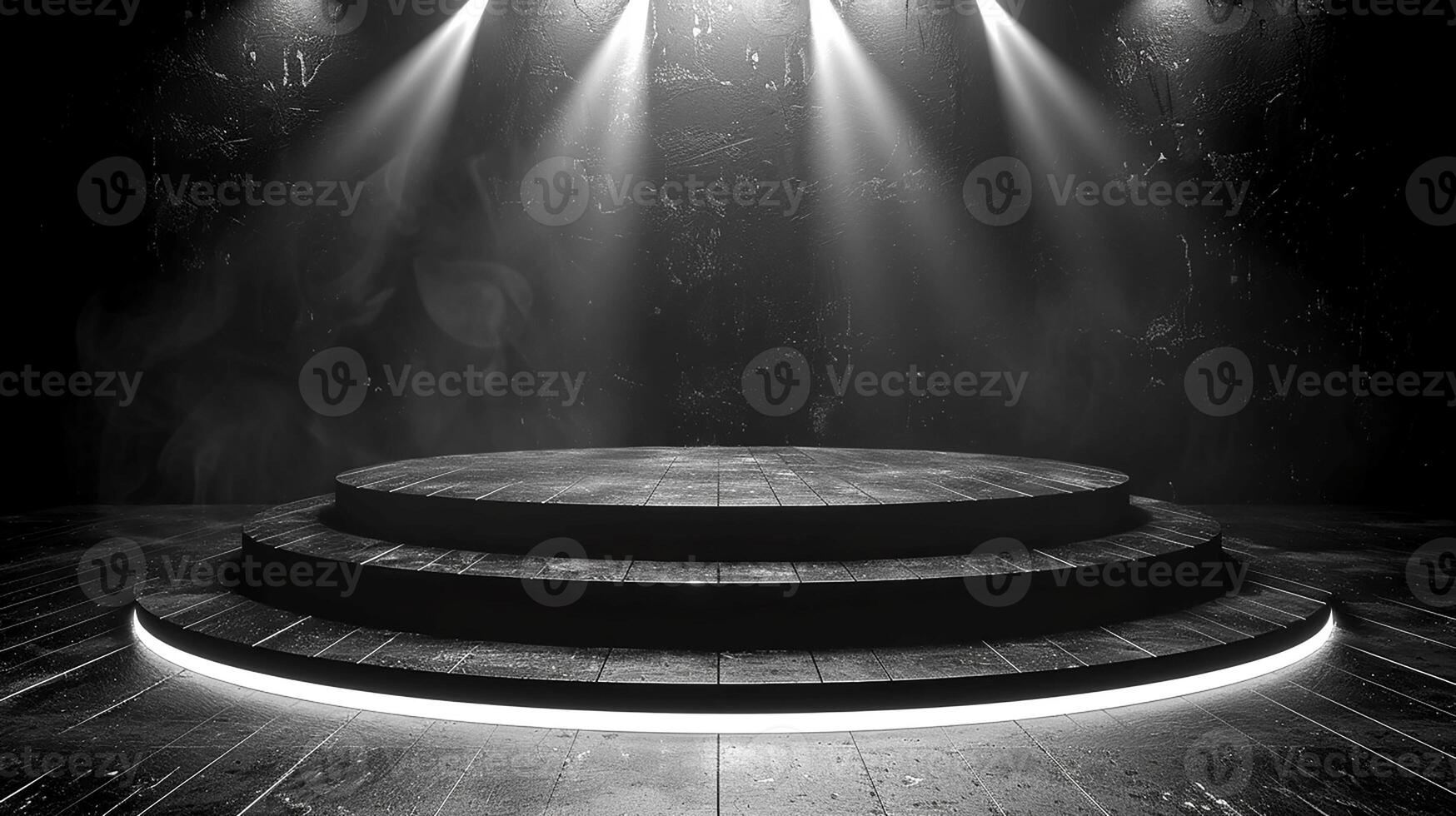 Black and white photo of a stage with spotlight