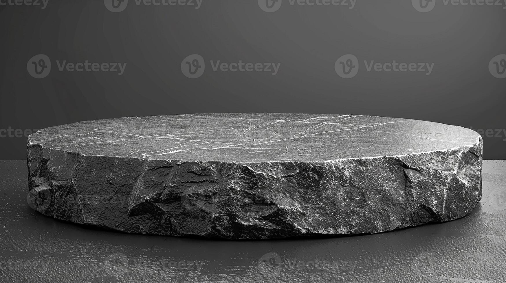 A large black stone table on a table photo