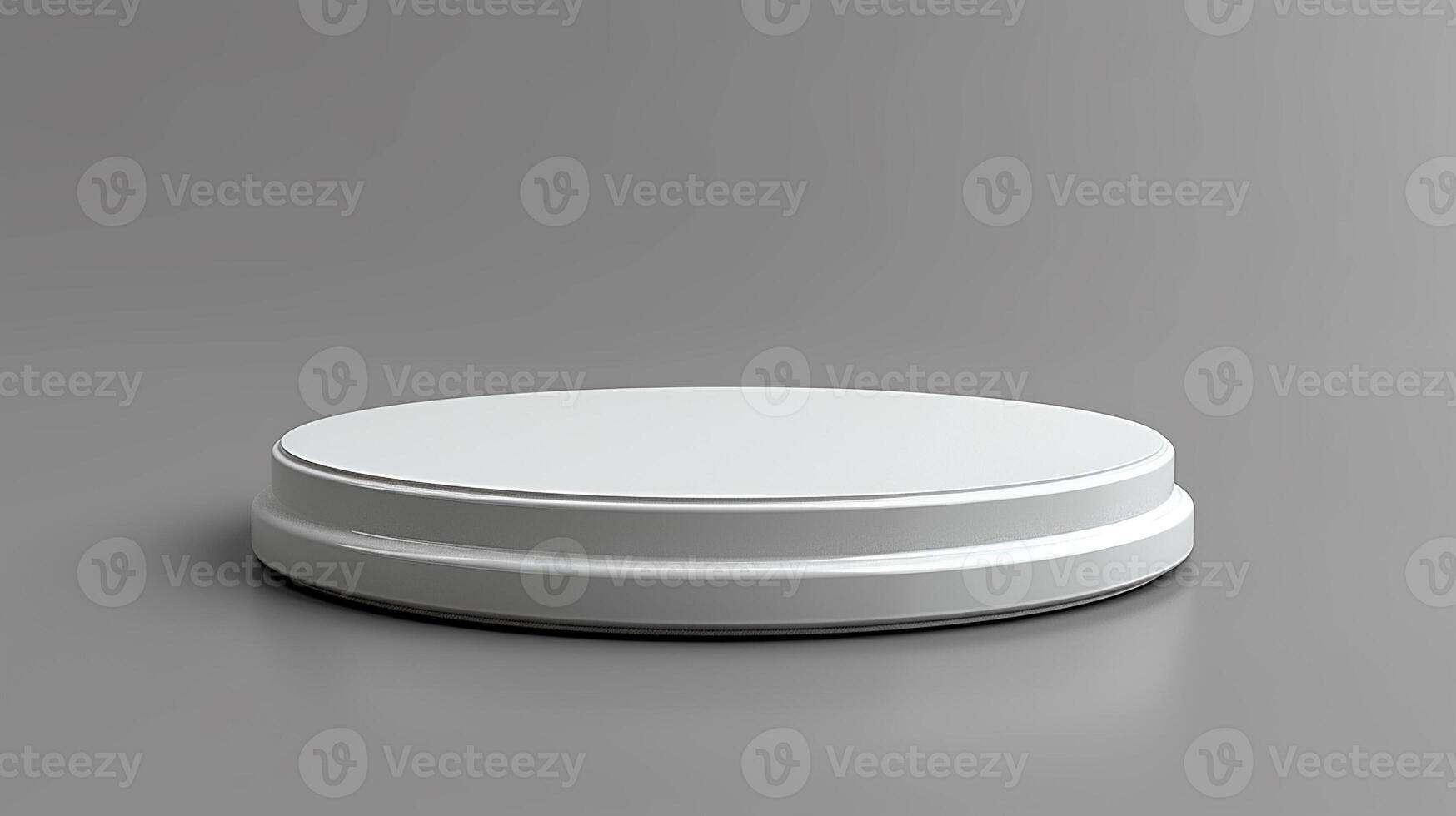 A white round object on a gray surface photo