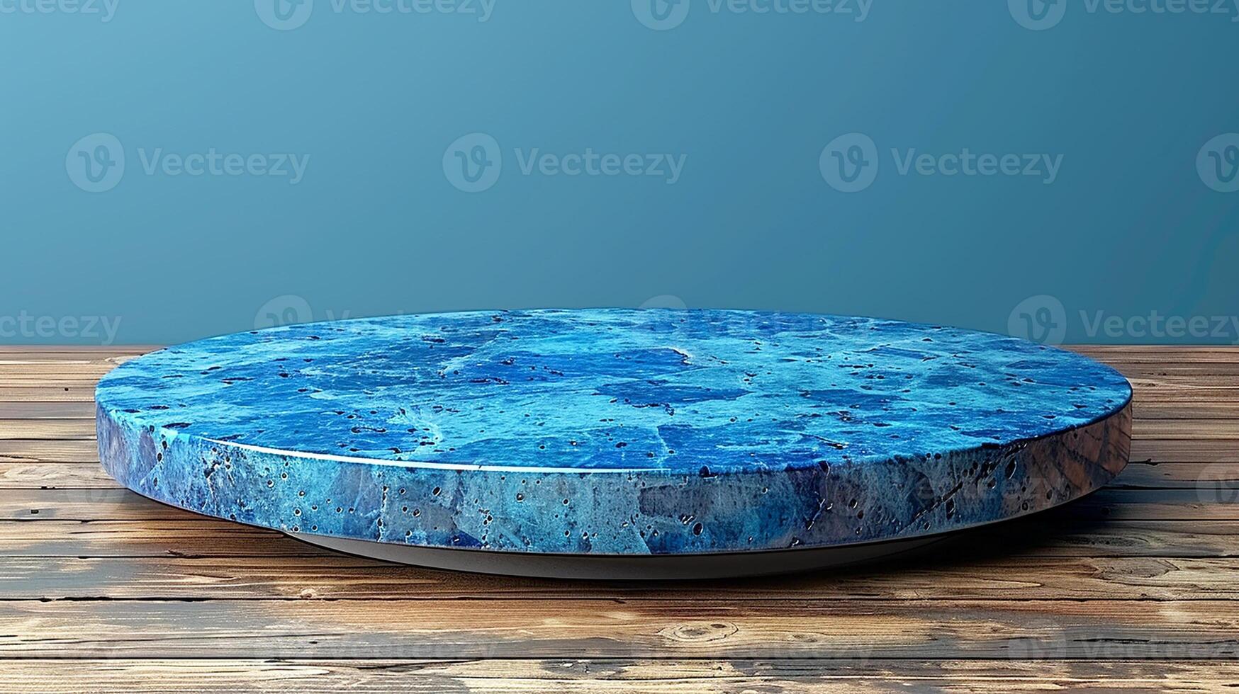 A blue marble table on a wooden floor photo