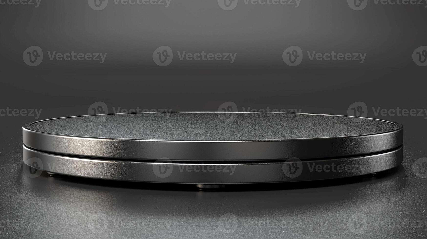 A black round table with a silver top photo