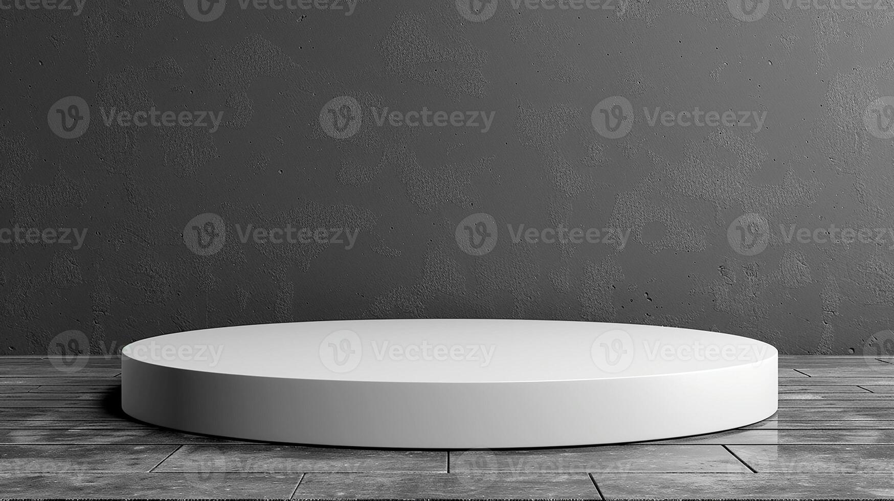 Round white pedestal on wooden floor in front of a gray wall photo