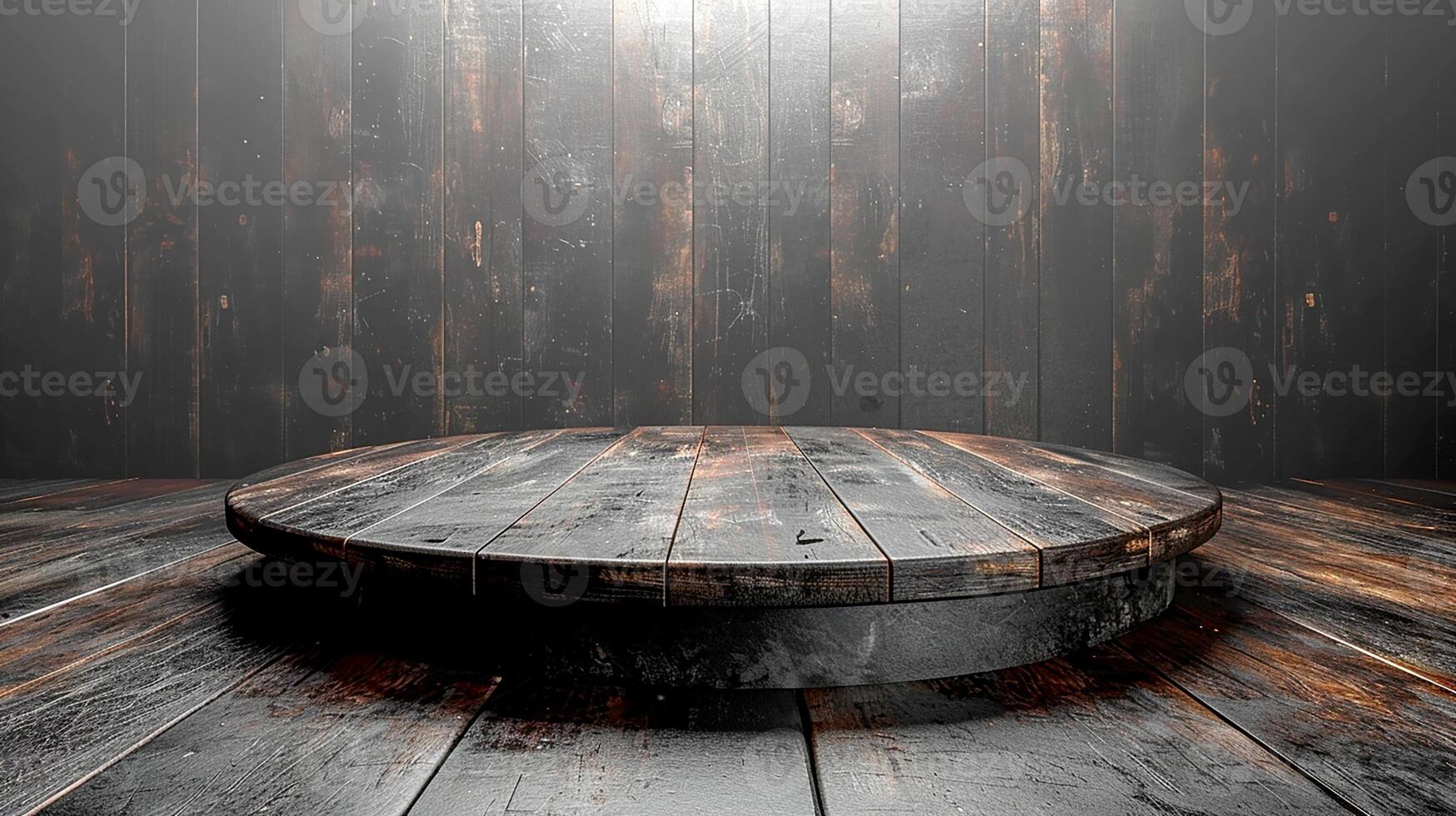 An empty wooden floor with a round table in the middle photo