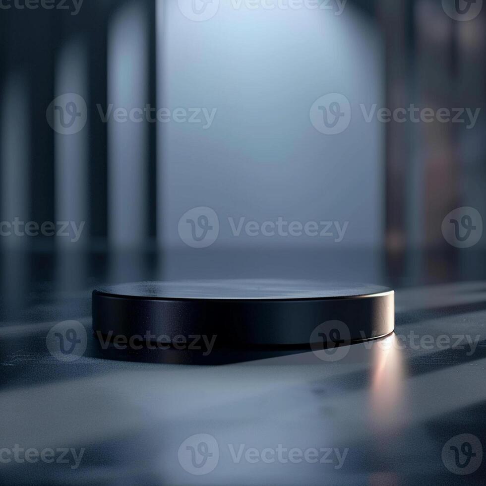 A black object sitting on a table in a dark room photo