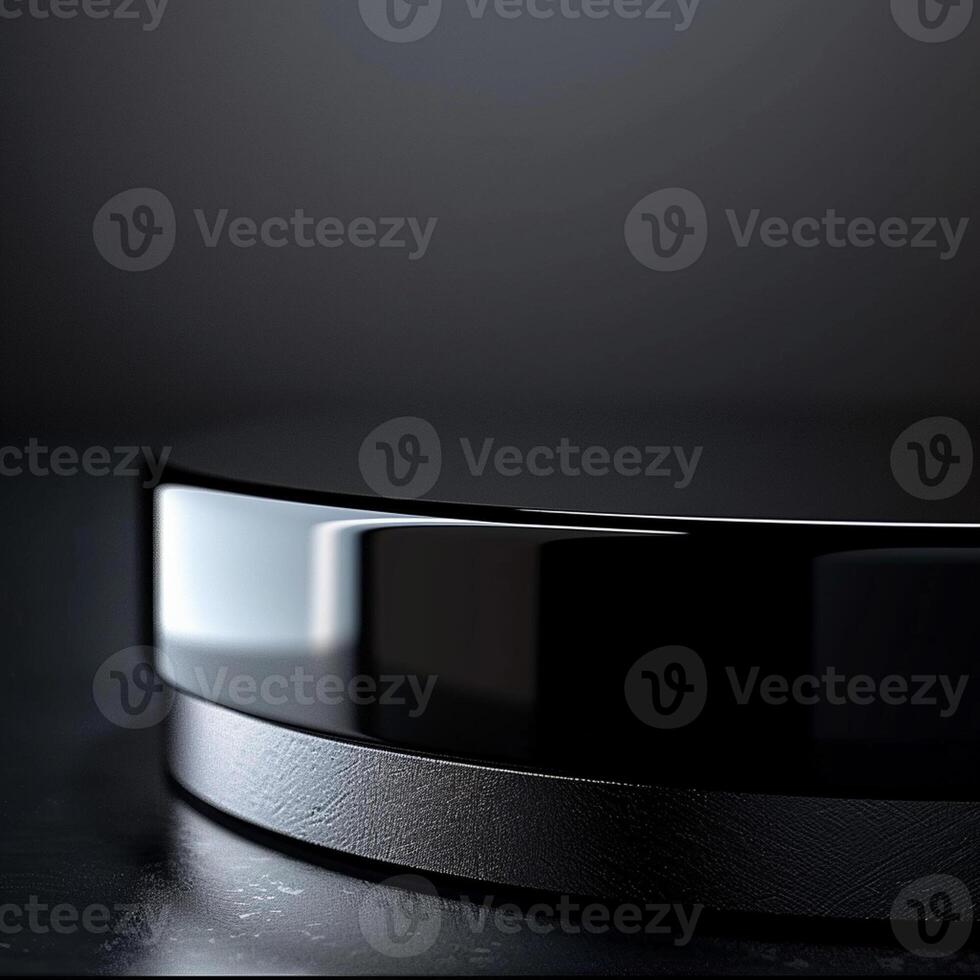A black and silver circular object on a table photo