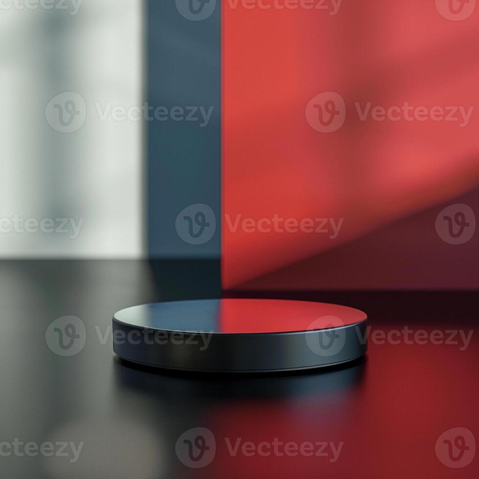 A black and red object sitting on a table photo