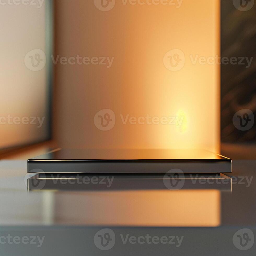 A modern looking laptop on a table in front of a window photo