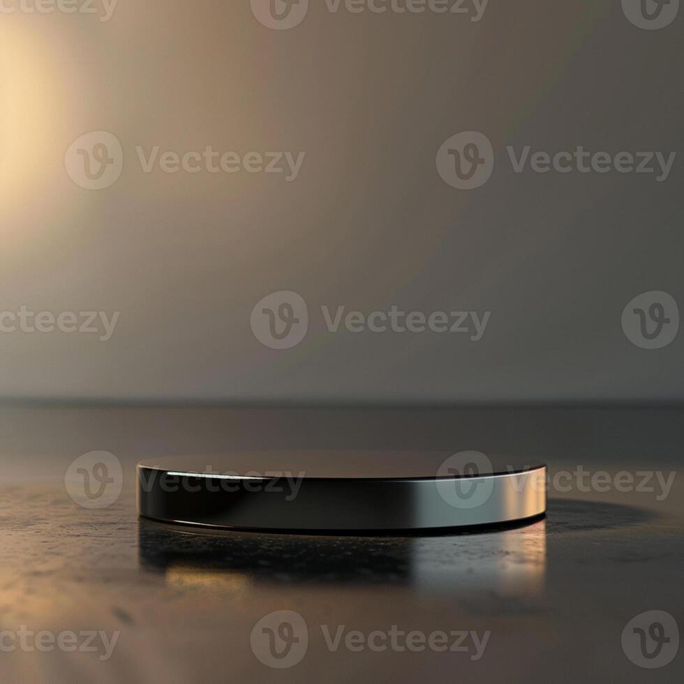 A black and silver object sitting on a table photo
