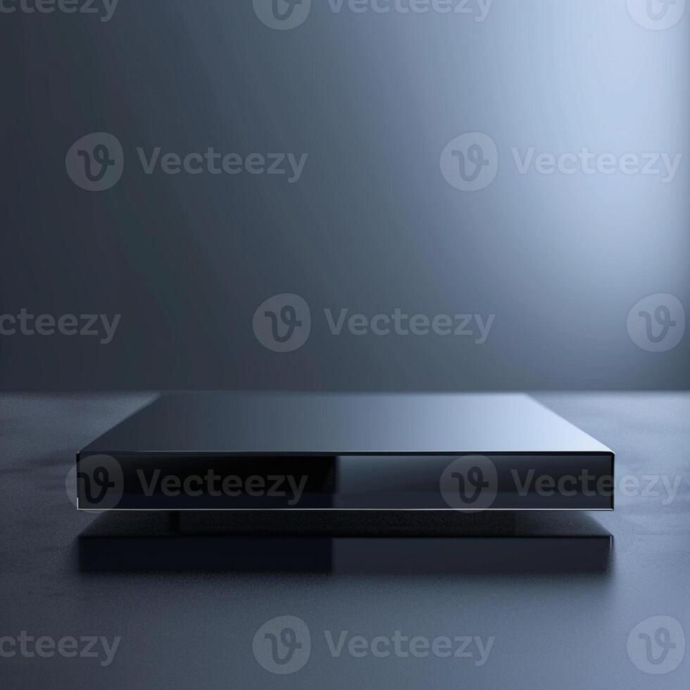 A black box sitting on a table with a light photo