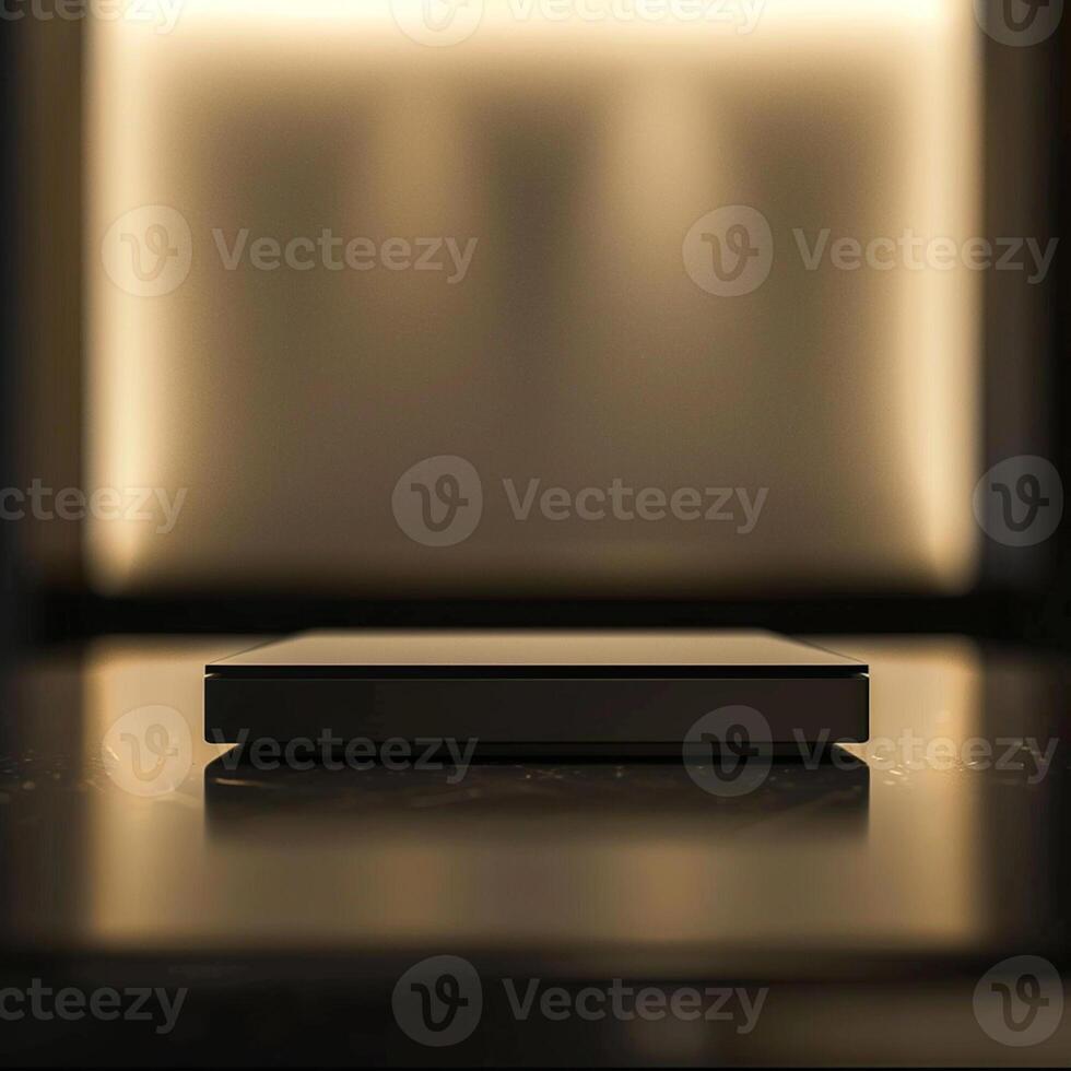 A black box sitting on a table in front of a wall photo