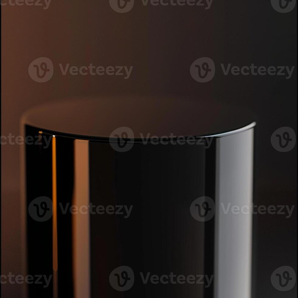A black cylinder on a table with a light photo