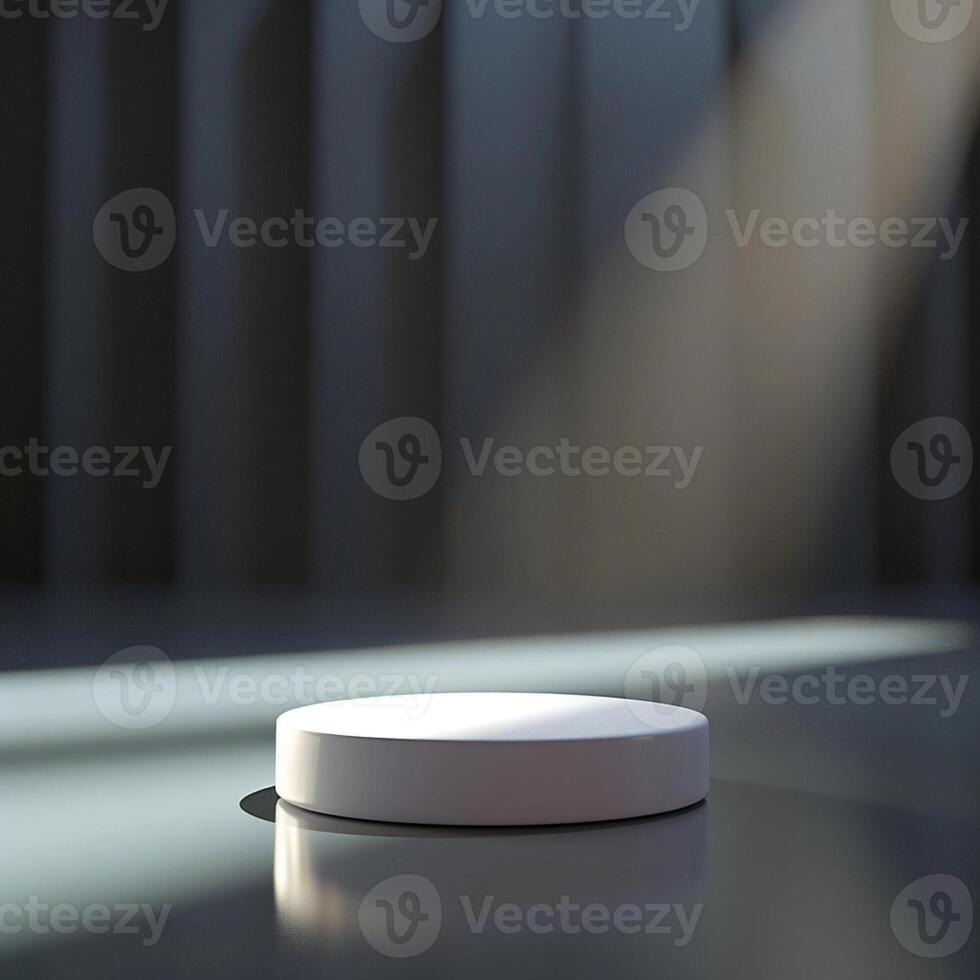 A white round object on a table in front of a wall photo