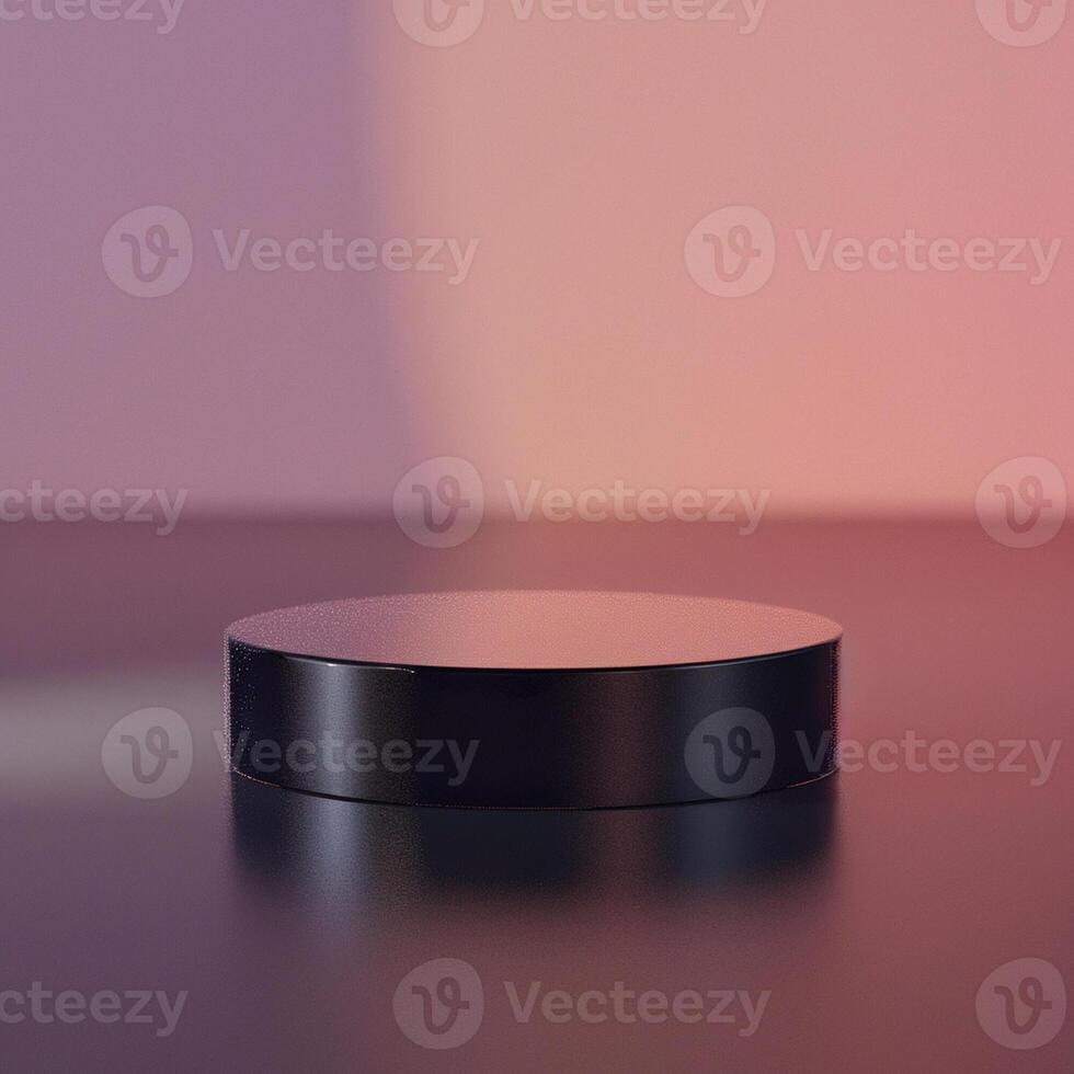 A black round object on a table with a pink background photo