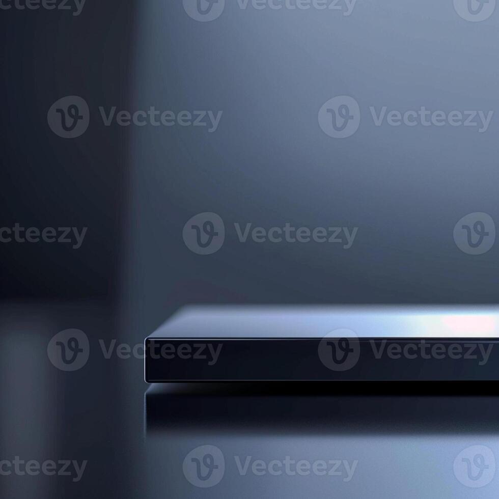 A black and silver device on a table photo