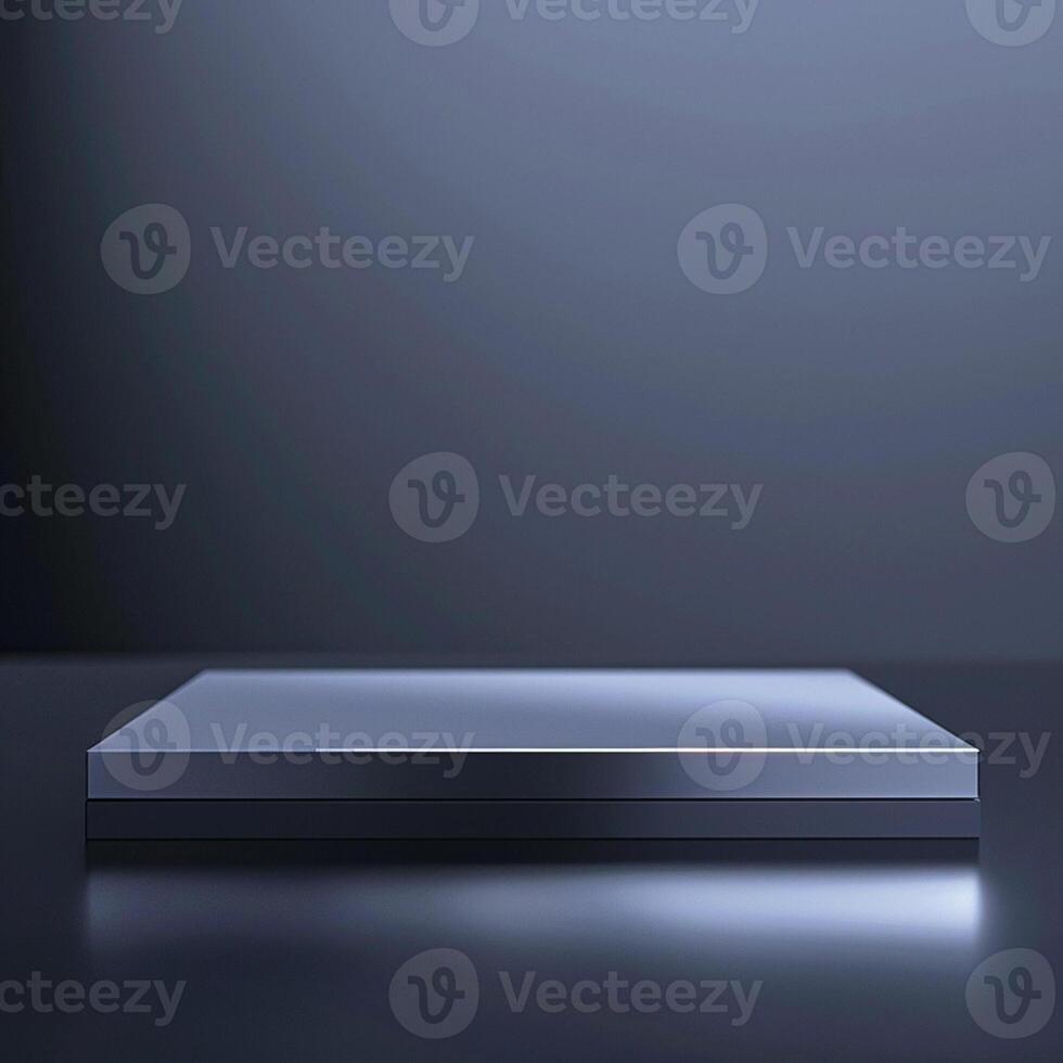 A silver box sitting on a table with a light photo