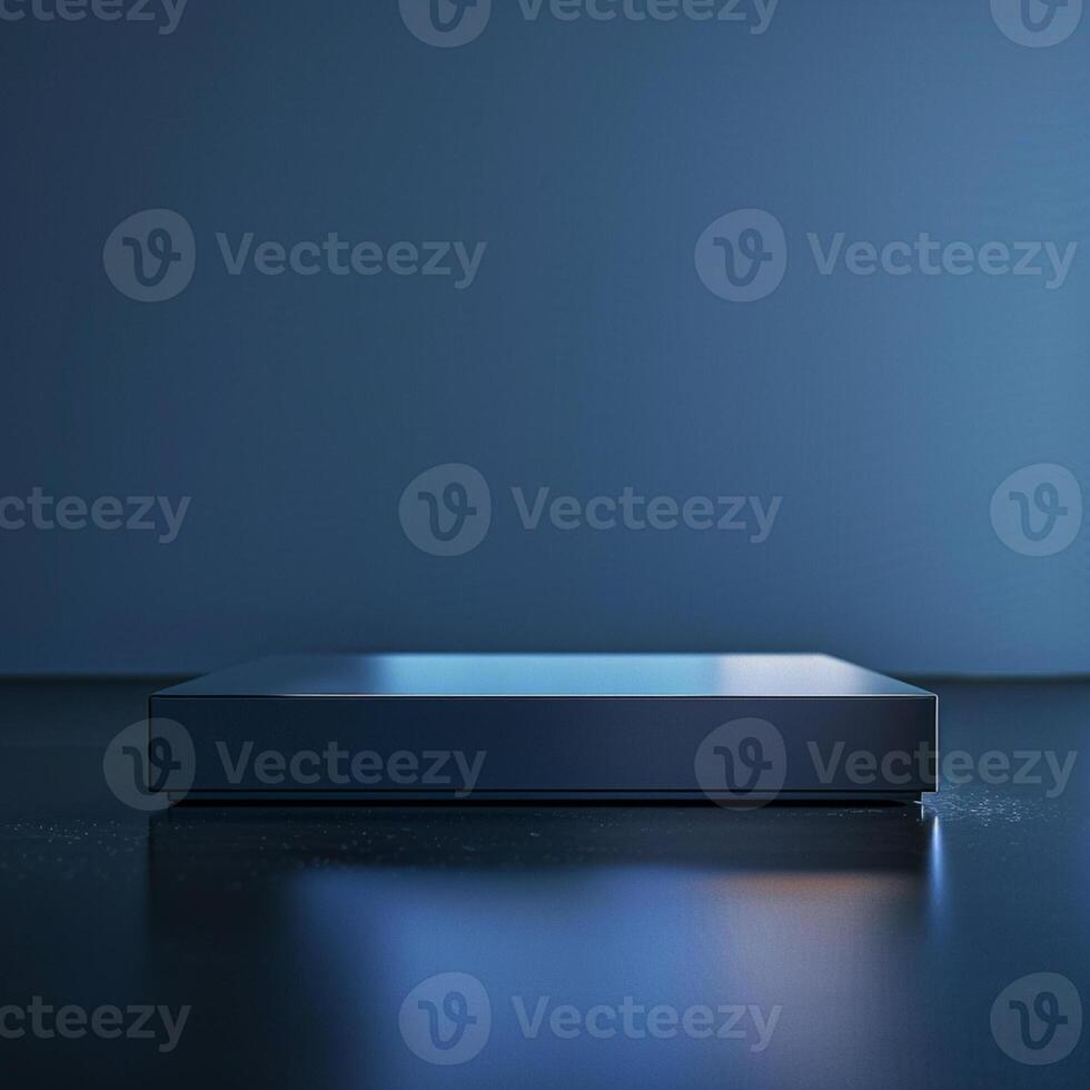 A blue box sitting on a table in front of a wall photo
