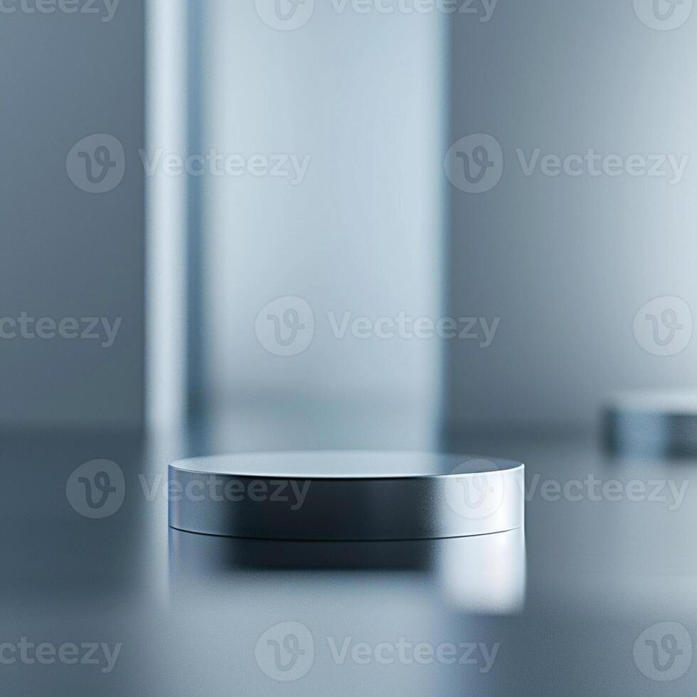 A silver round object on a table in front of a white wall photo