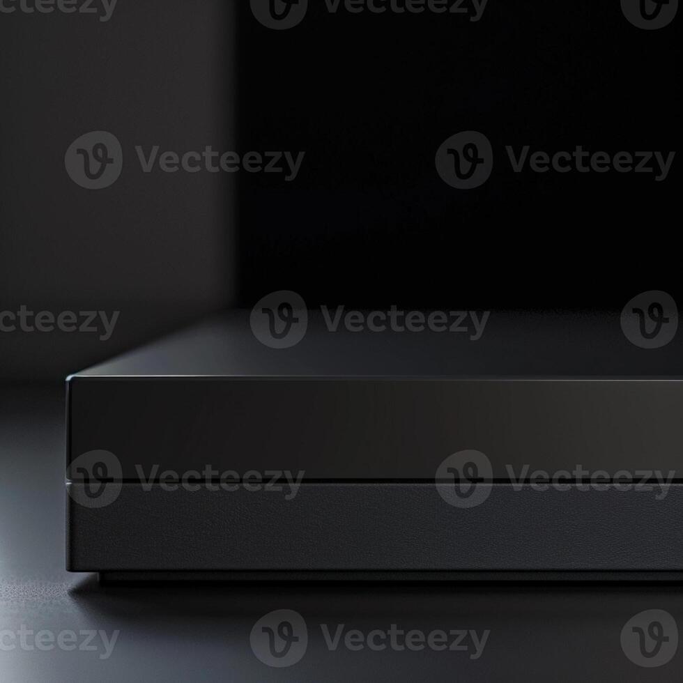 The xbox one s is a black box with a black controller photo