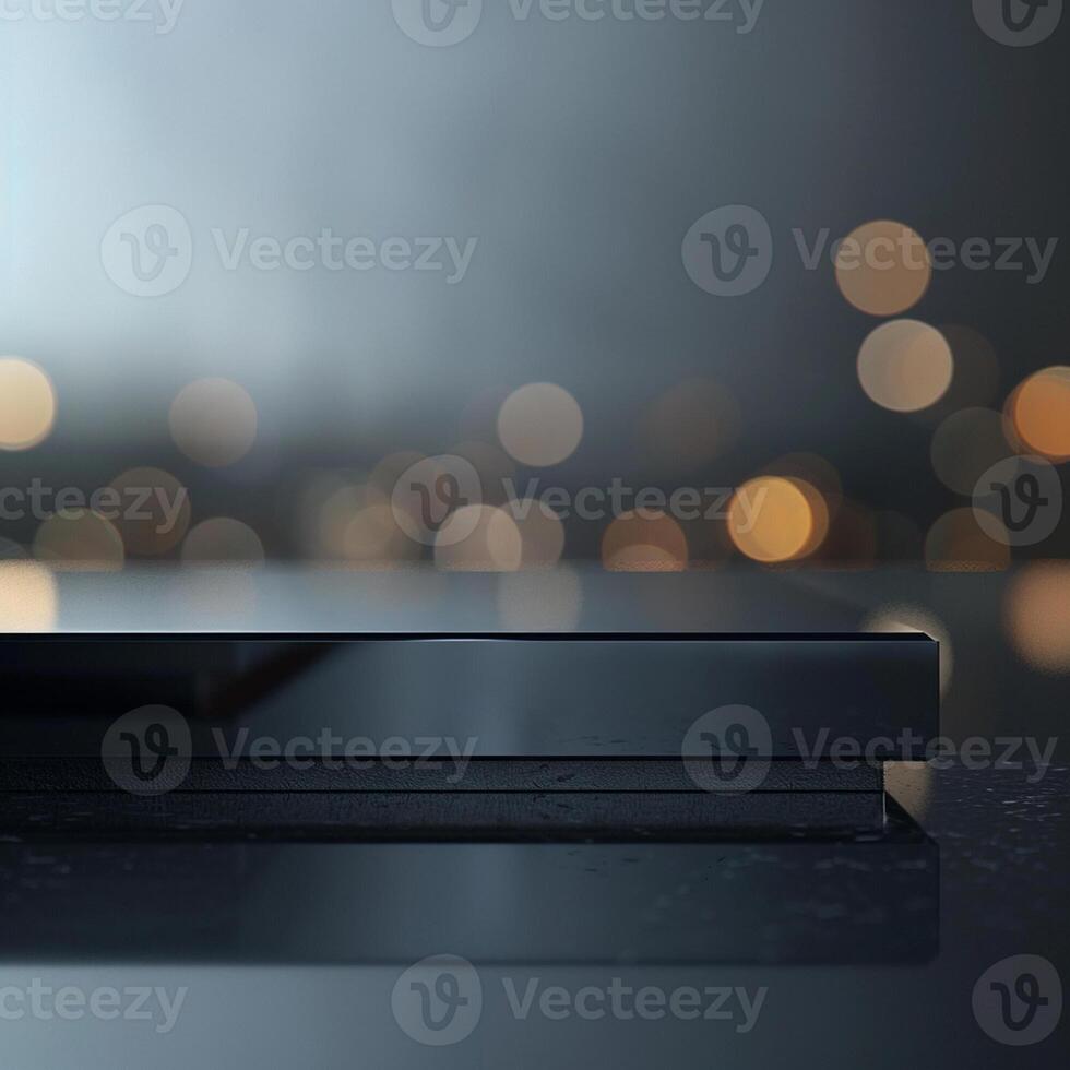 A black and silver device sitting on a table photo